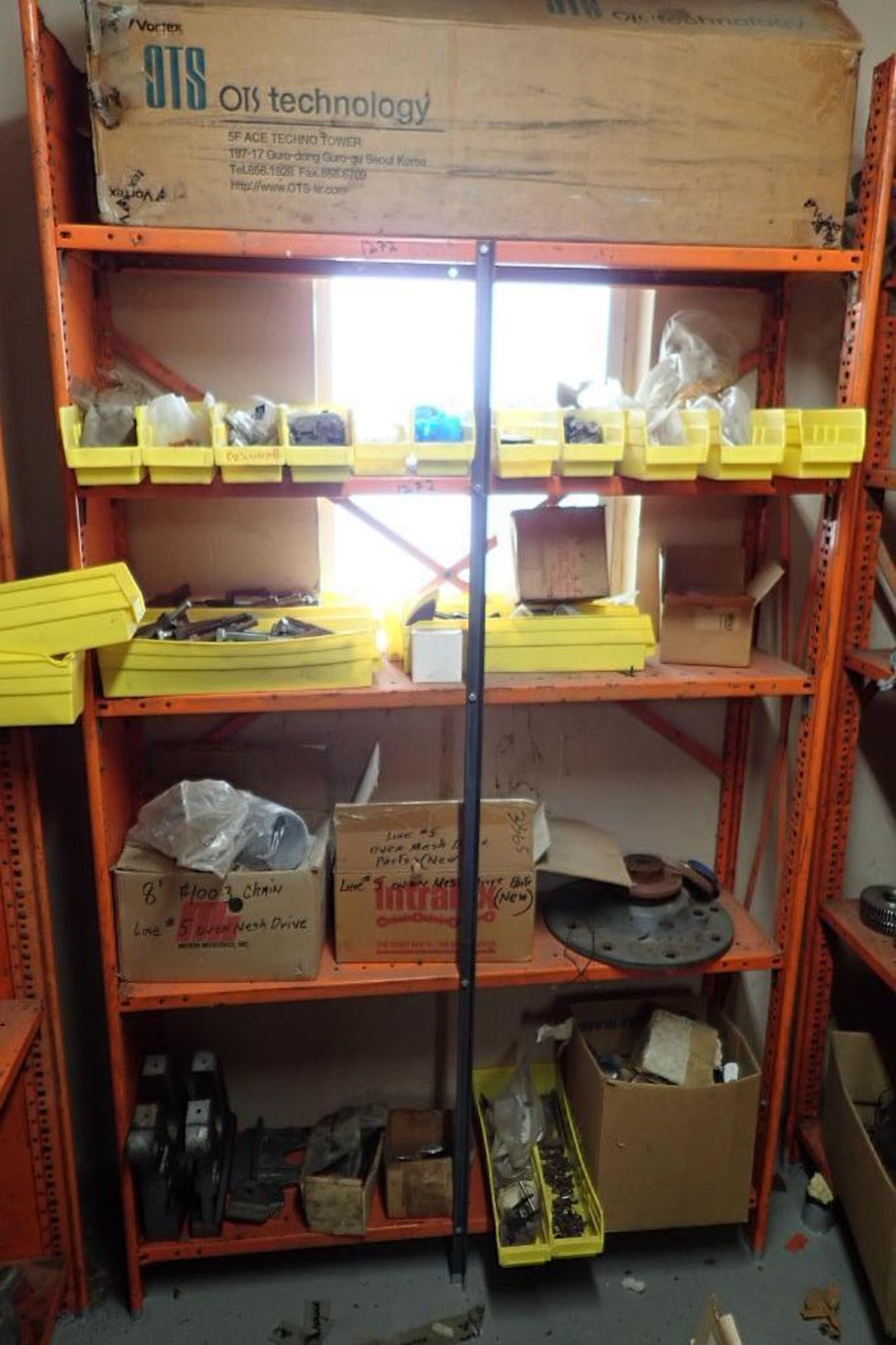 Contents only of 4 sections of shelving of assorted parts, gears, lug chain. **Rigging Fee: $150** - Image 2 of 21