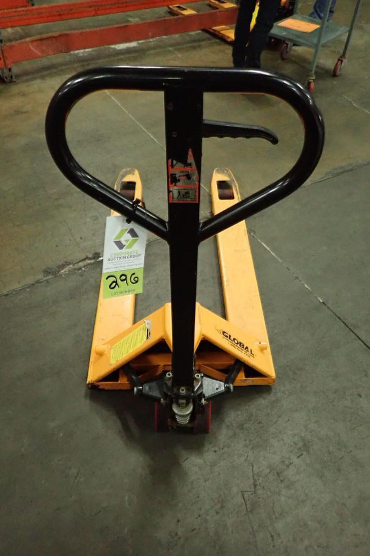 Global Industrial pallet jack, 5500 lb. capacity, SN E698805, yellow.. **Rigging Fee: $10** - Image 3 of 4