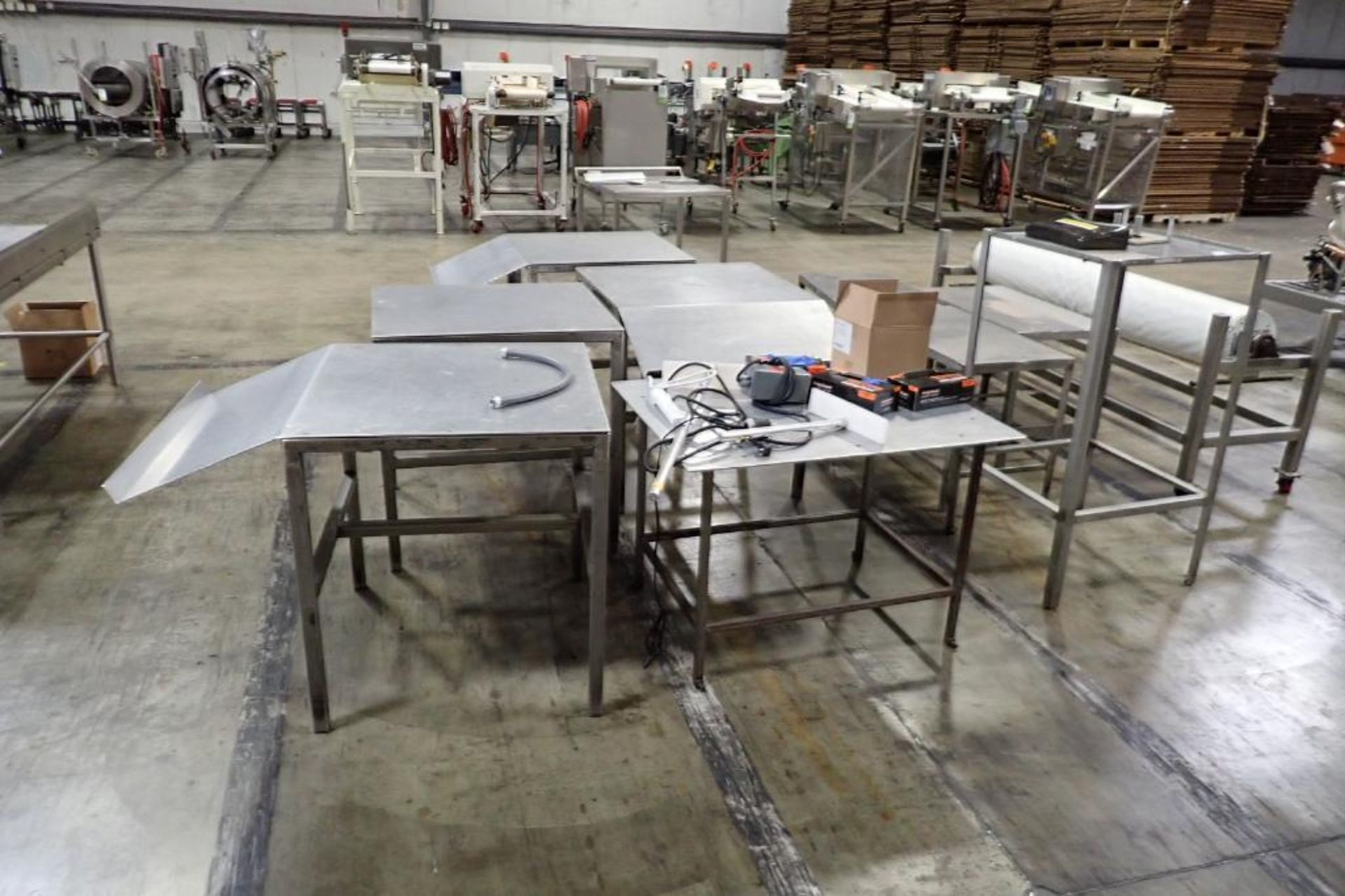 Lot of assorted SS tables. **Rigging Fee: $350** - Image 3 of 6
