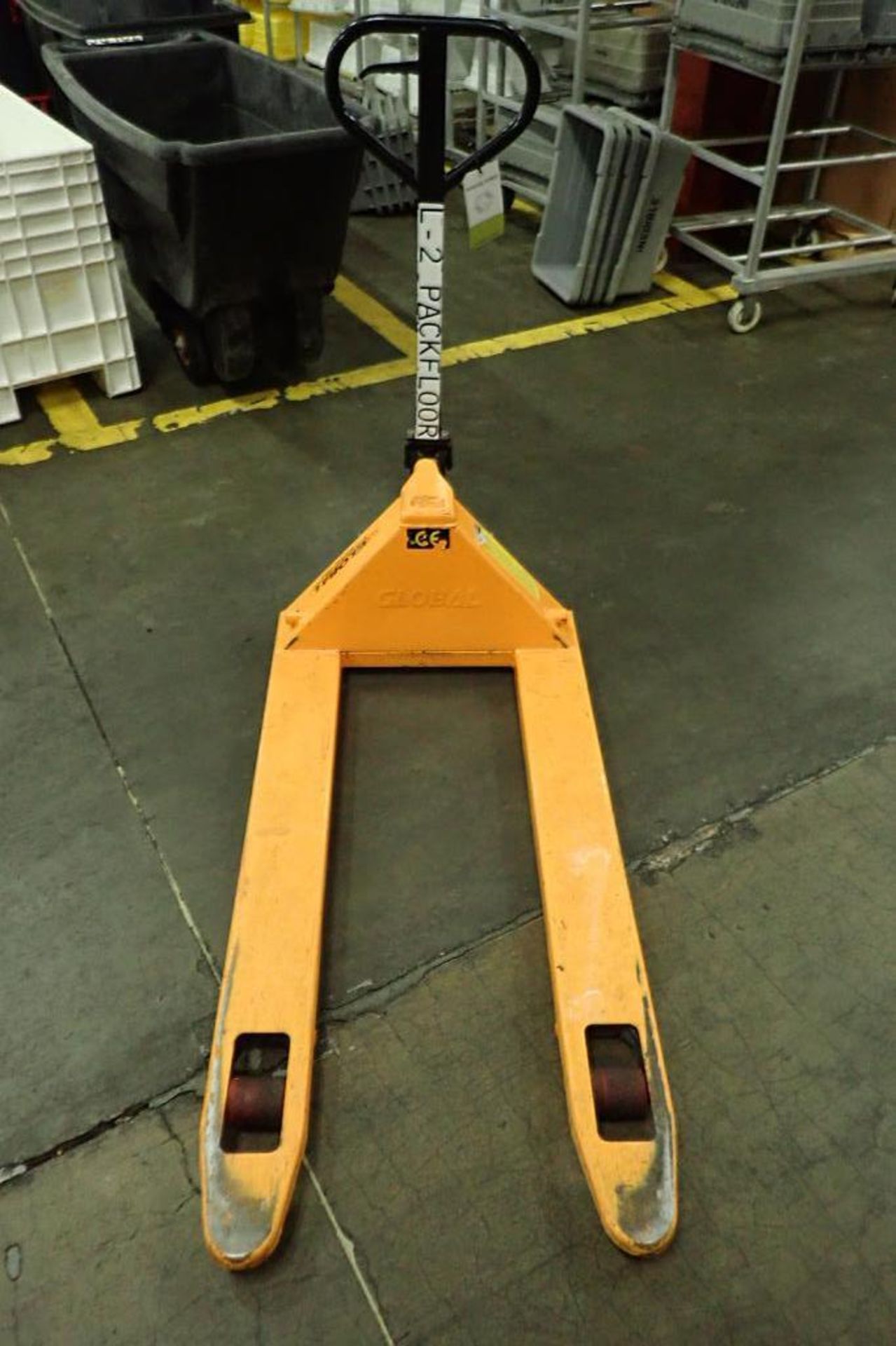 Global Industrial pallet jack, 5500 lb. capacity, SN E698805, yellow.. **Rigging Fee: $10** - Image 2 of 4