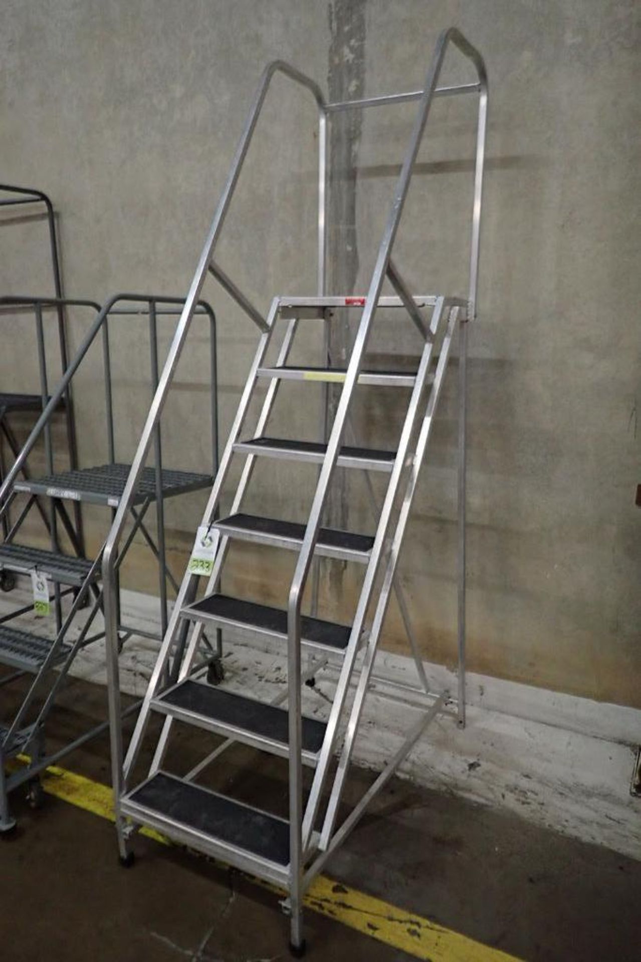PW Platforms 7-step aluminum rolling warehouse ladder. **Rigging Fee: $25** - Image 2 of 4