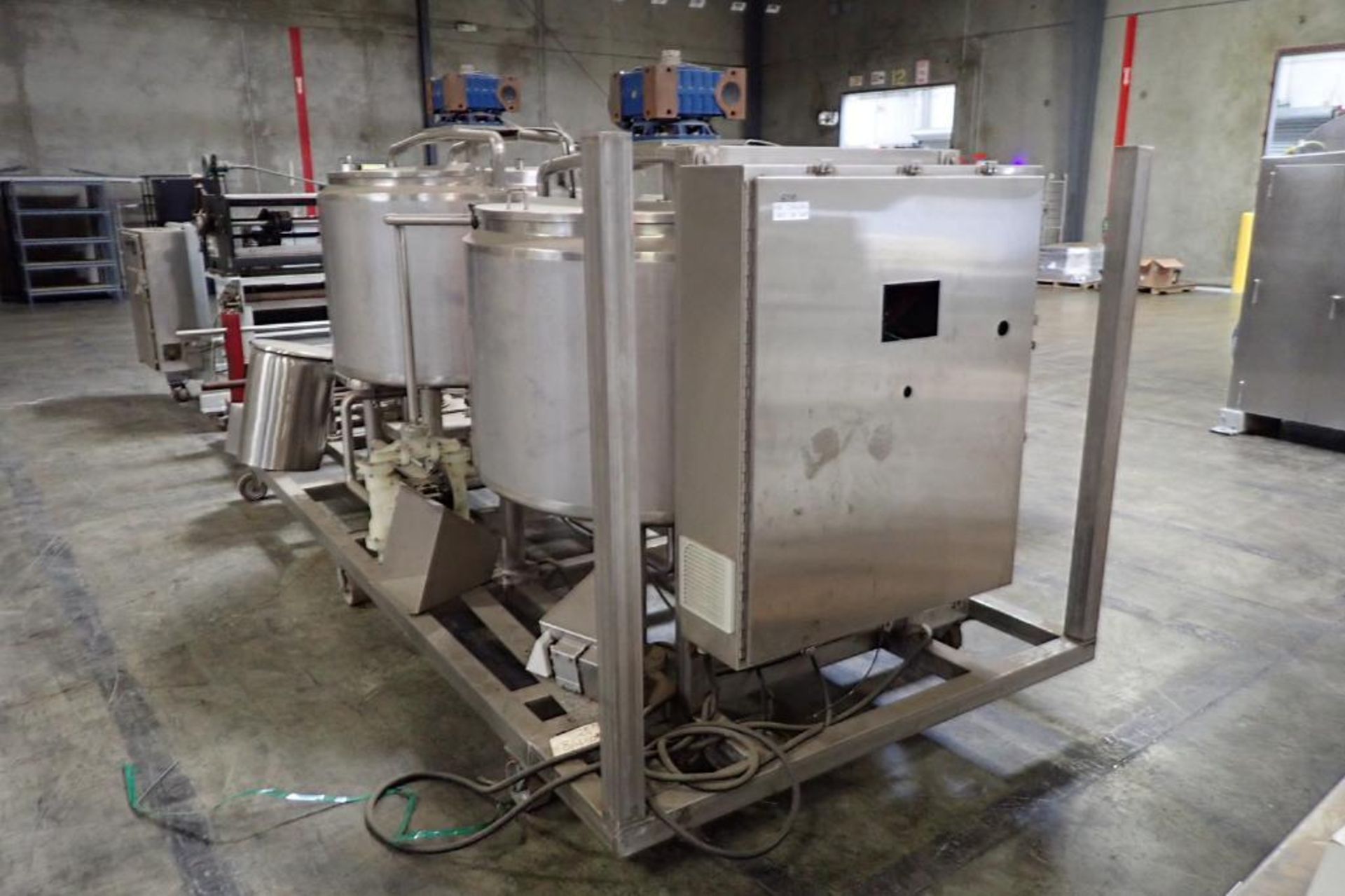 Unused stainless steel skid mounted: (1) jacketed 800 liter emulsifier with top agitation, (1) 800 l - Image 3 of 27