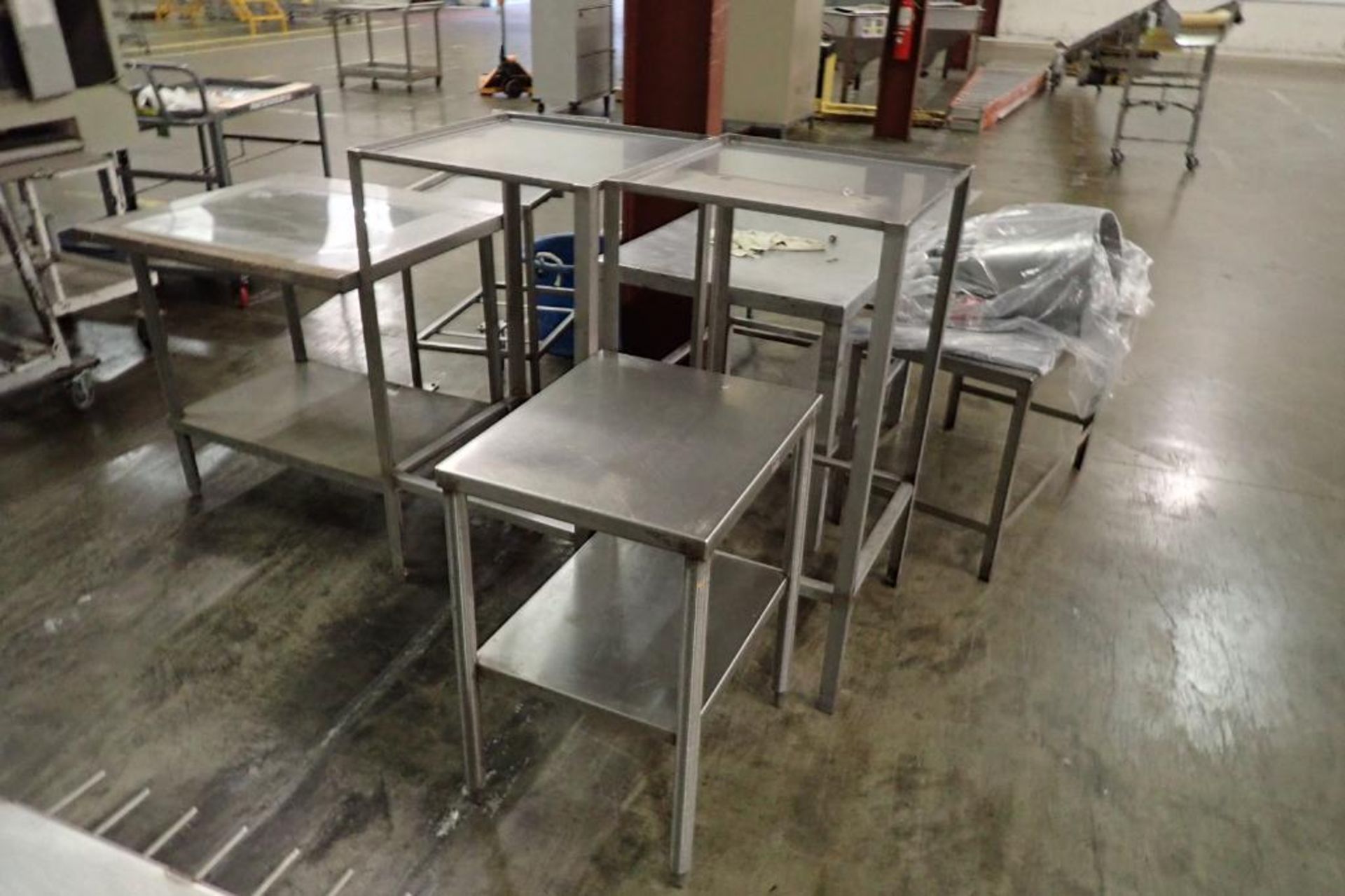 Lot of assorted SS tables. **Rigging Fee: $150** - Image 2 of 4