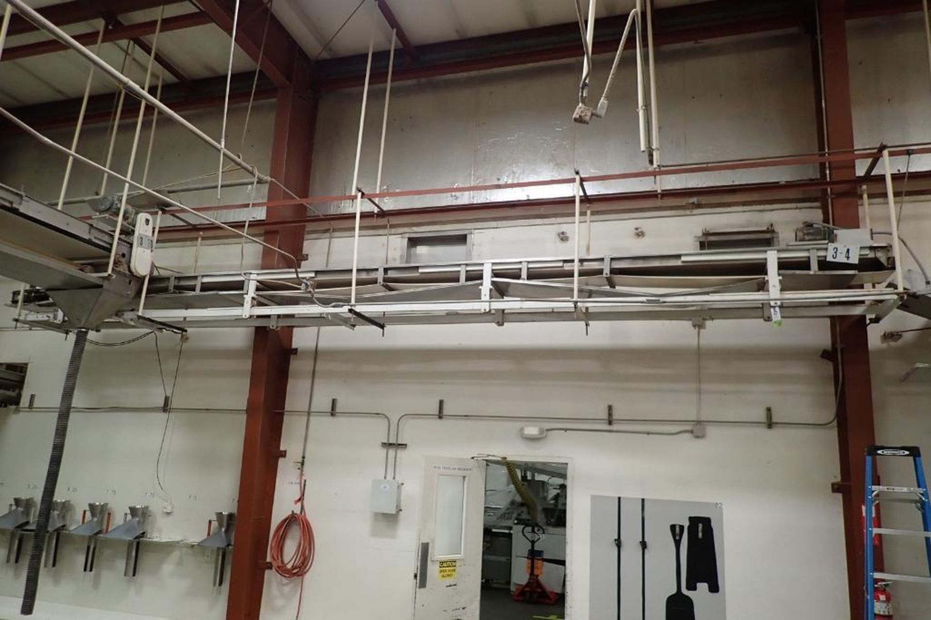 Mild Steel belt conveyor, 30 ft. long x 15 in. wide, suspended from ceiling. **Rigging Fee: $400**