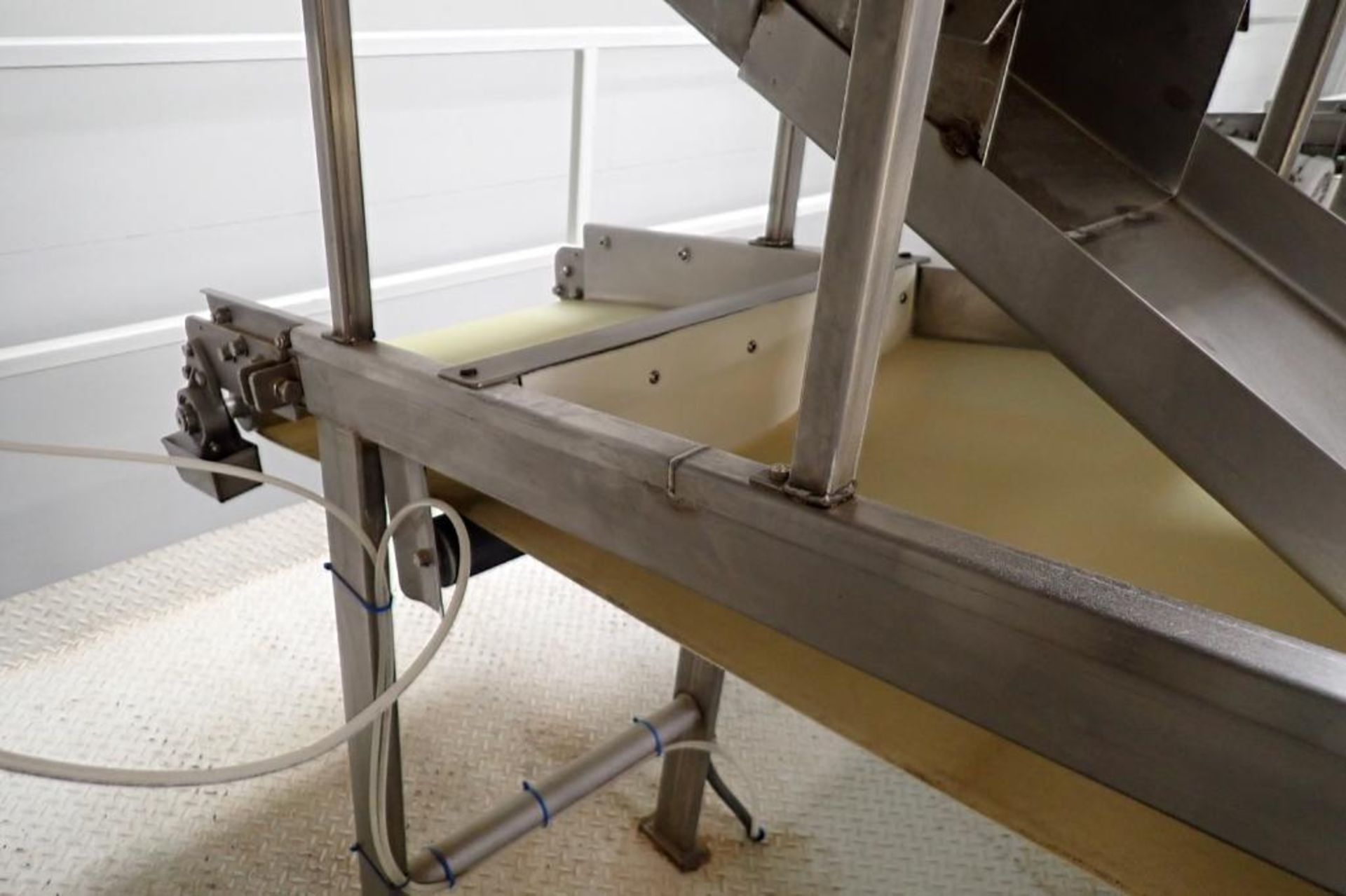 SS belt conveyor, 10 ft. long x 20 in. wide, from vibratory conveyor to top of scale. **Rigging Fee: - Image 3 of 6