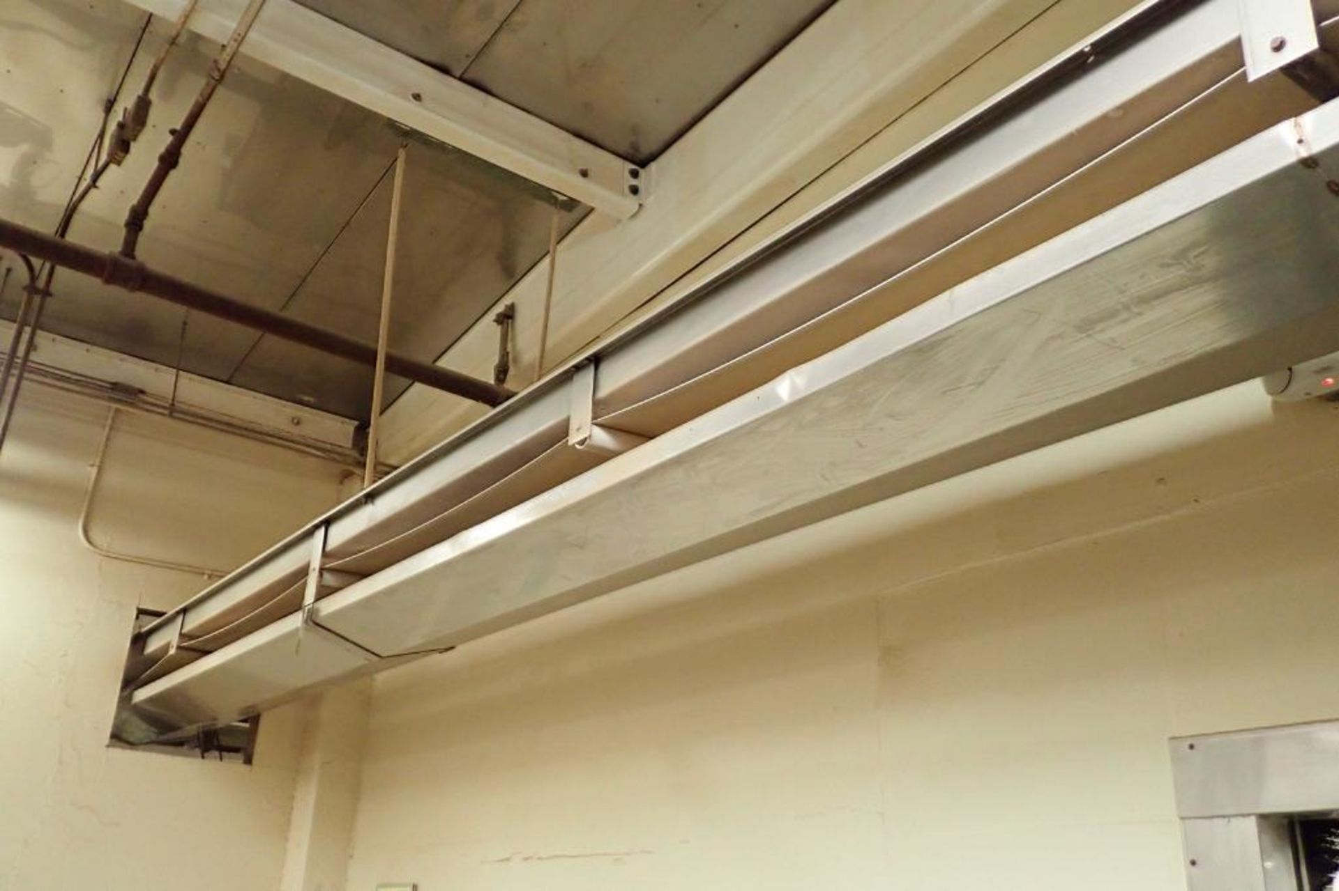 SS belt conveyor, 26 ft. long x 18 in. wide, suspended from ceiling, with motor and drive. **Rigging - Image 4 of 6