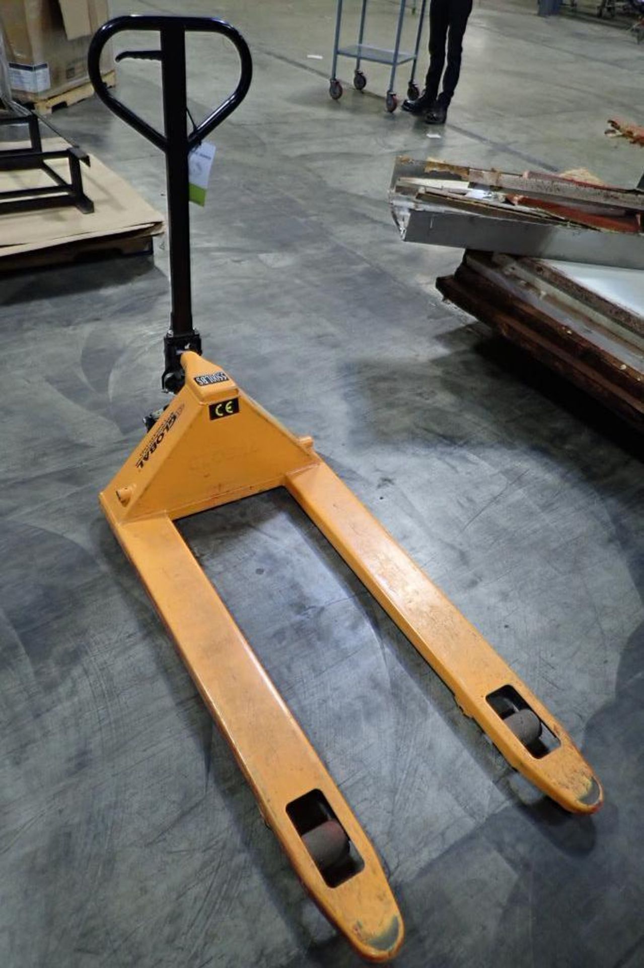 Global Industrial 5500 lb hand pallet jack, SN F684189, yellow. **Rigging Fee: $10** - Image 4 of 5