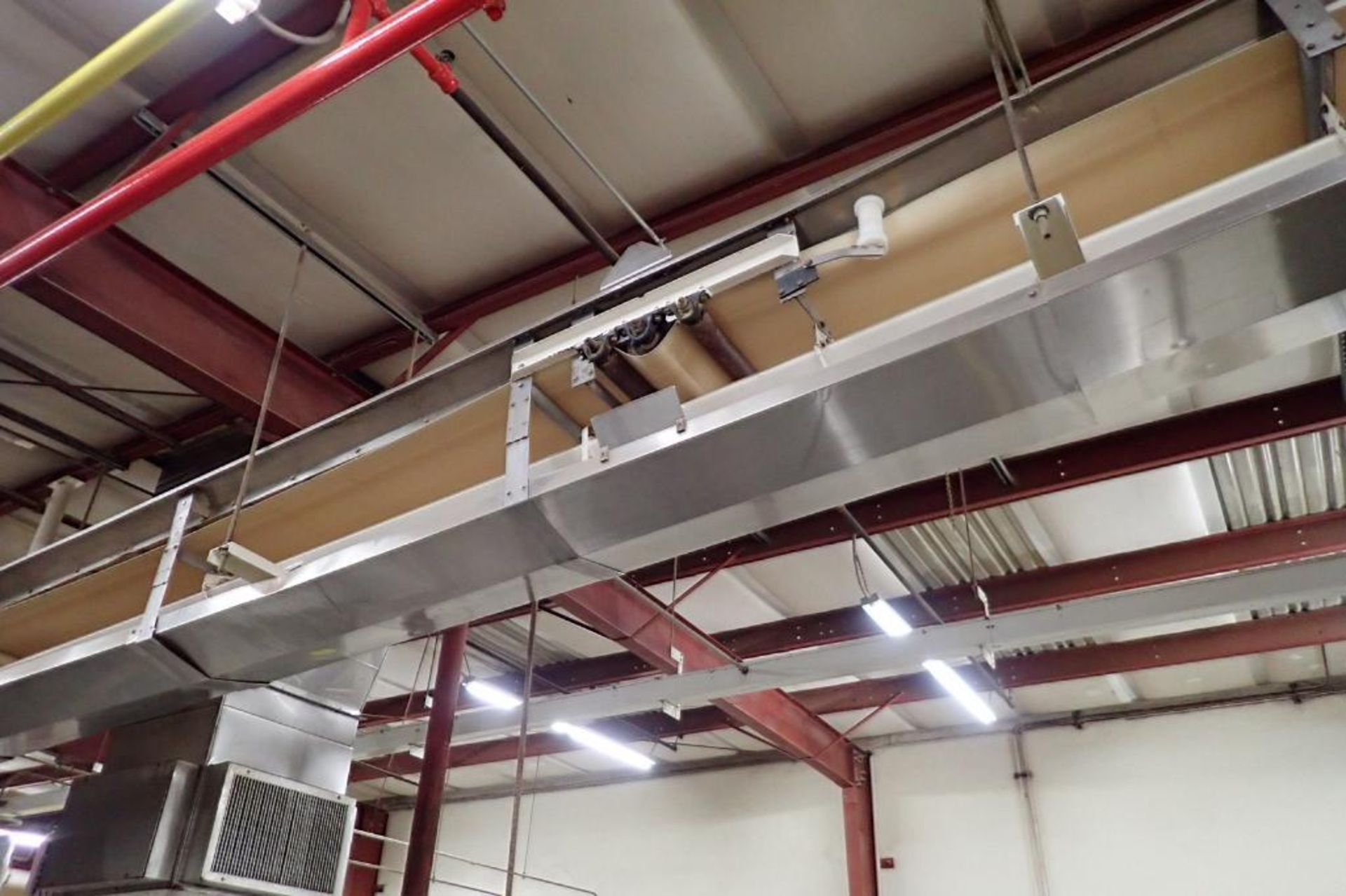 SS belt conveyor, 50 ft. long x 18 in. wide, suspended from ceiling. **Rigging Fee: $750** - Image 3 of 6