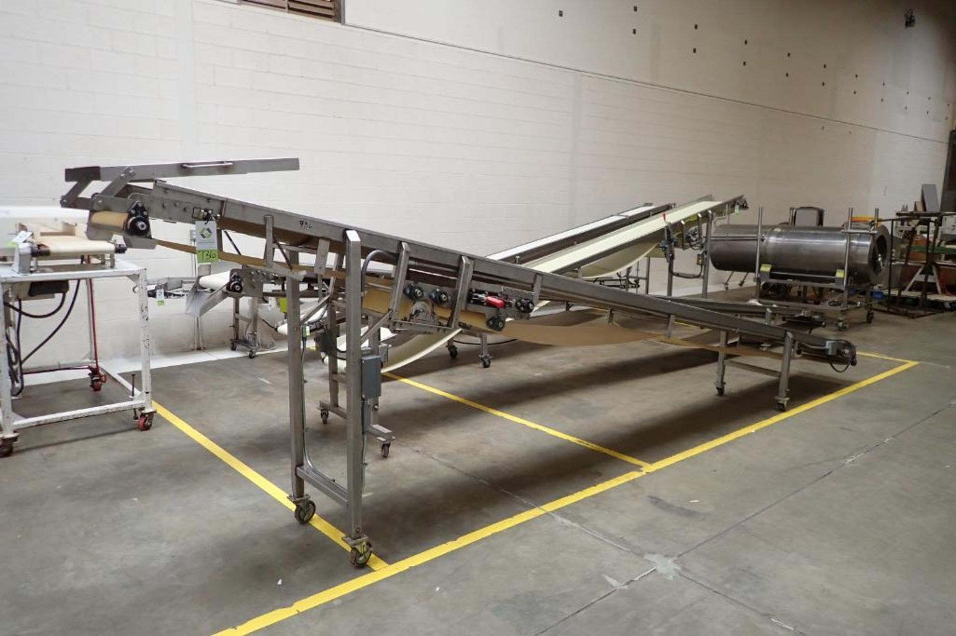 SS belt incline conveyor, 260 in. long x 18 in. wide, 70 in. discharge height, drum drive, on wheels