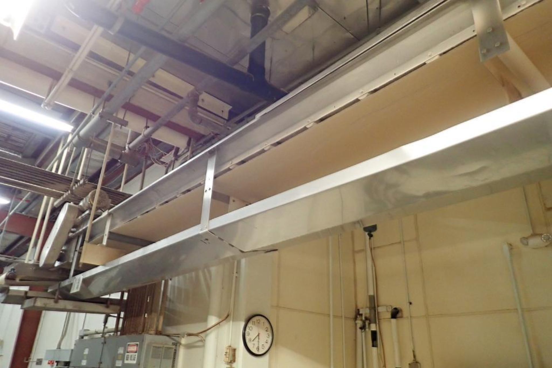 SS belt conveyor, 120 ft. long x 18 in. wide, suspended from ceiling, with motor and drive. **Riggin - Image 5 of 7