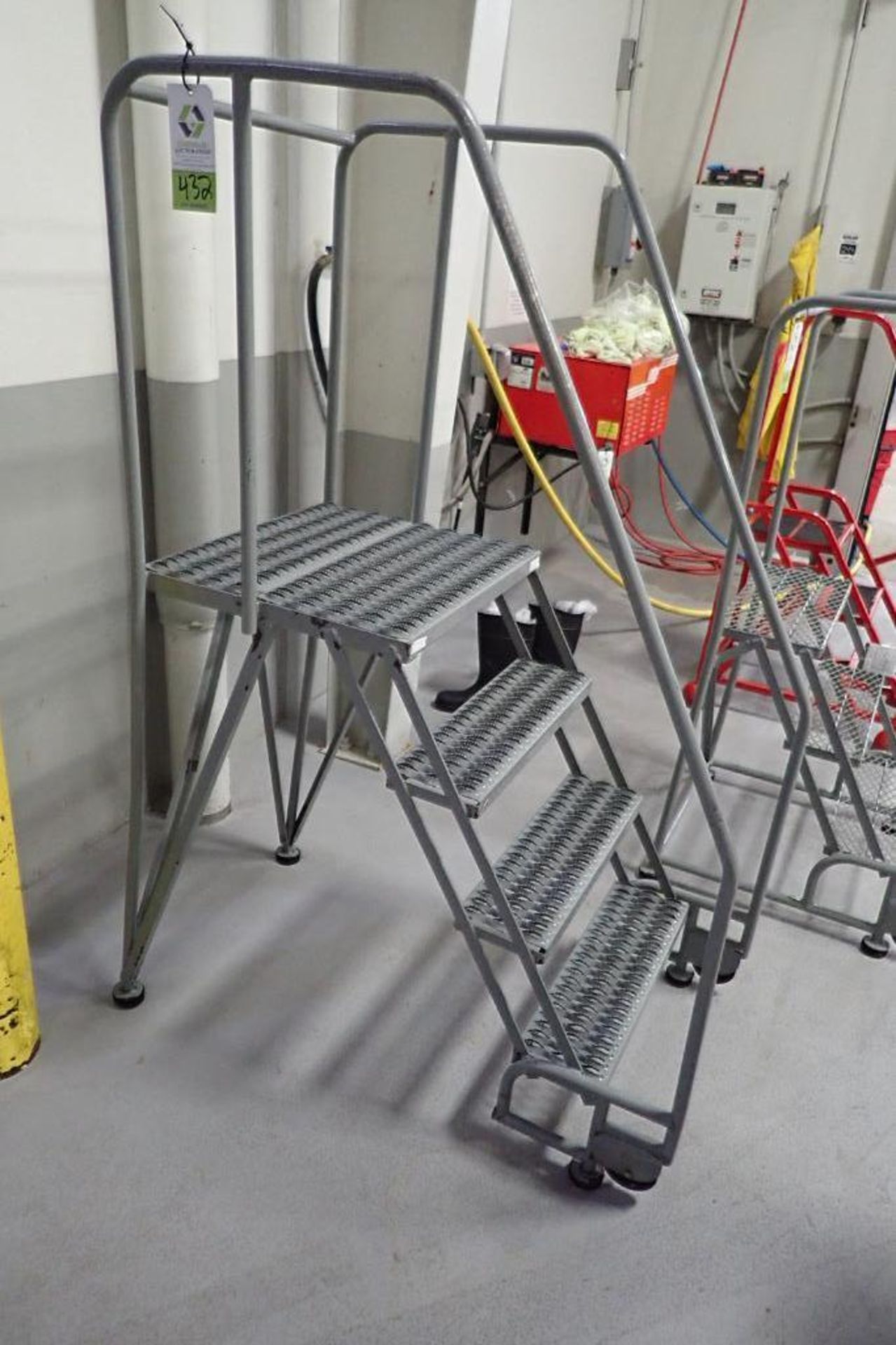 4-step Cotterman warehouse ladder. **Rigging Fee: $50**