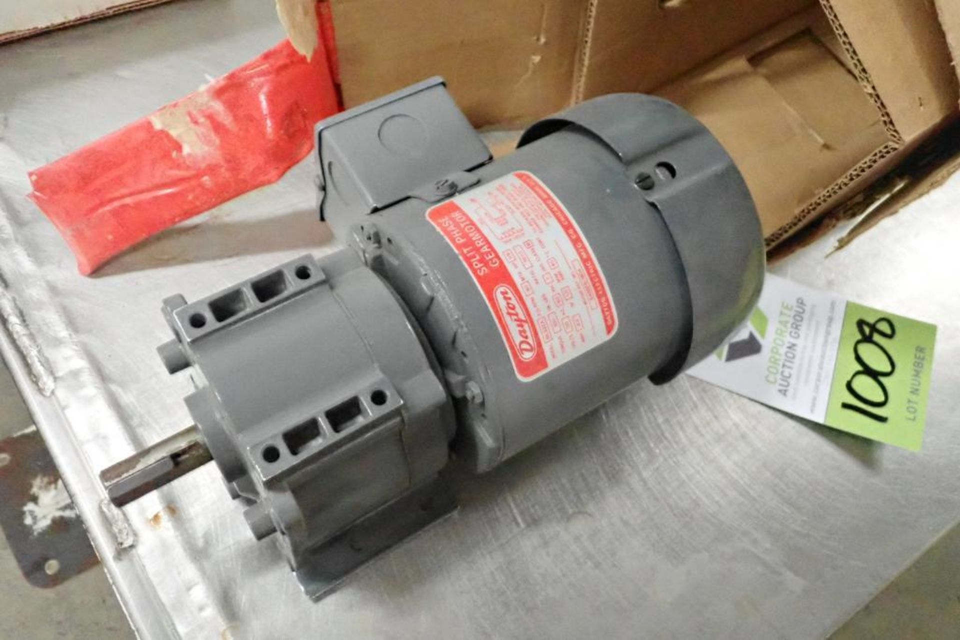 Unused Dayton split phase AC motor, 1/16 hp, 90 rpm, torque 100 in. lbs., ratio 19.1:1, 115 volt. **