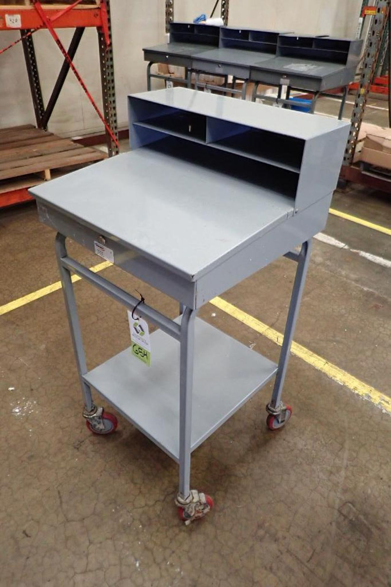 Win-Holt mild steel shipping desk on casters. **Rigging Fee: $10** - Image 2 of 4