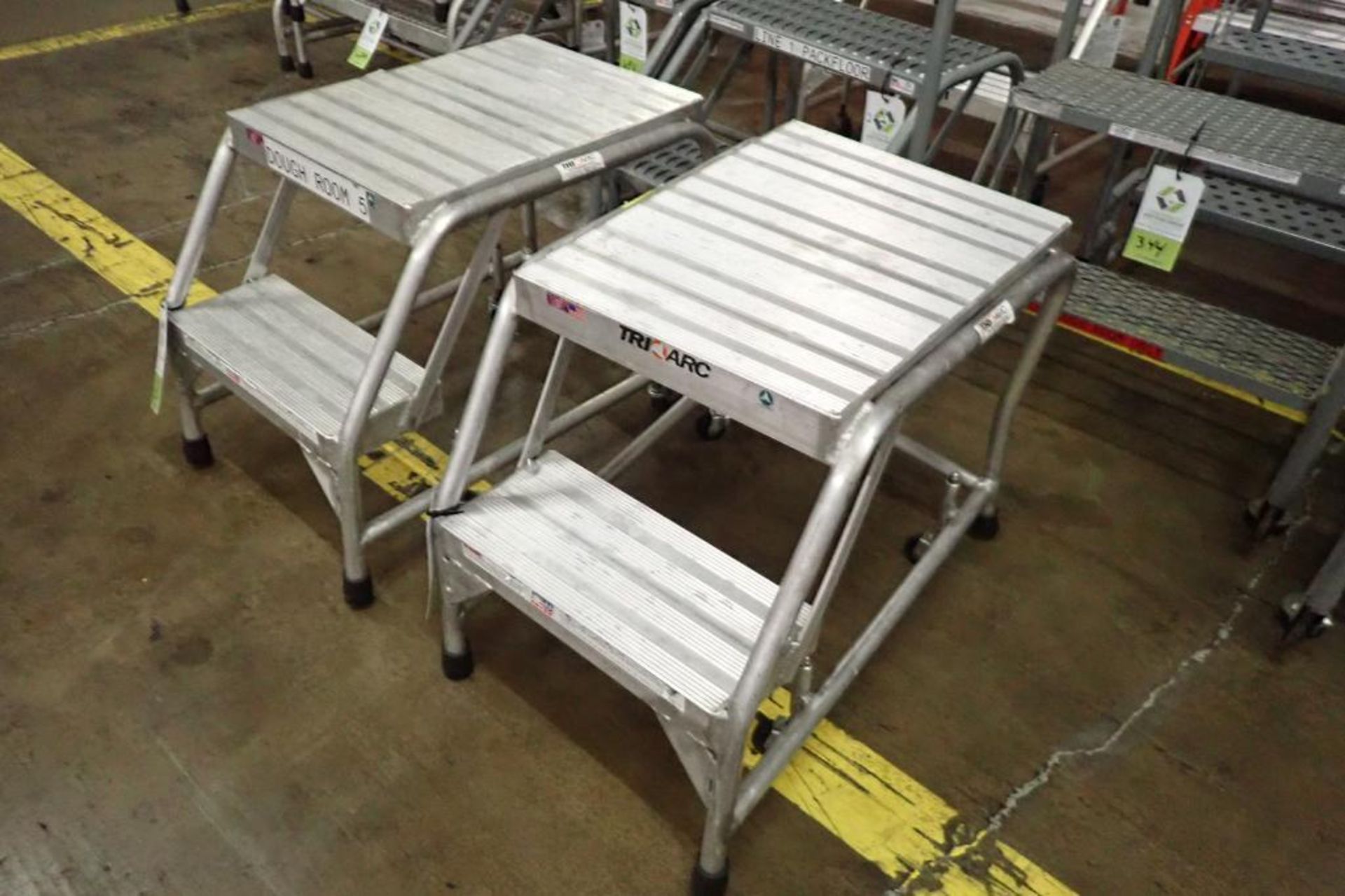 Tri Arc 2-step aluminum rolling step. **Rigging Fee: $50** - Image 2 of 6