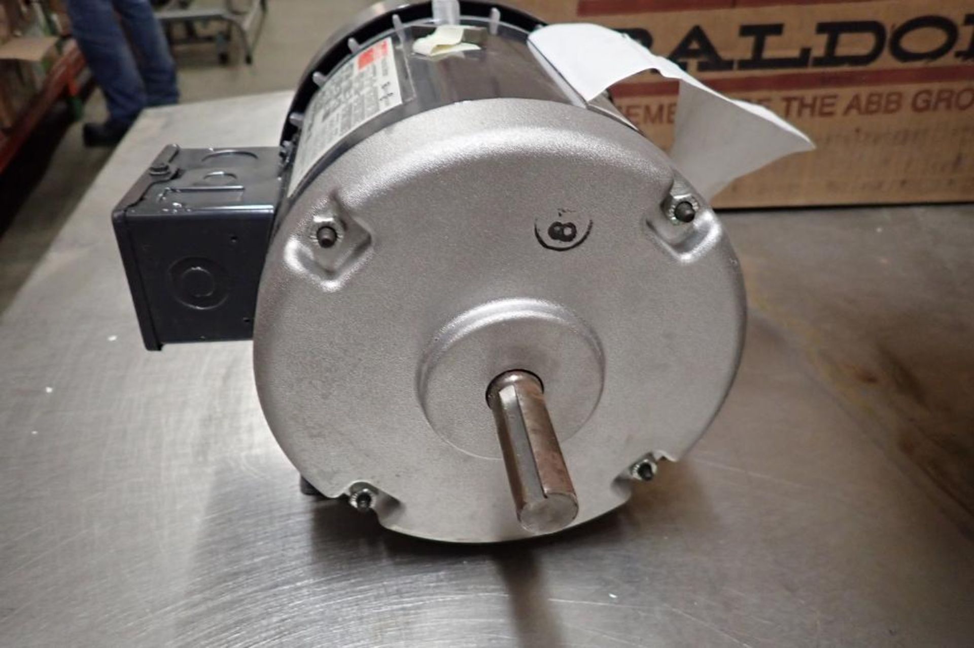 Unused Dayton AC motor, 1/3 hp, 1725 rpm, Frame 56, 208-230/460 volt. **Rigging Fee: $10** - Image 2 of 7