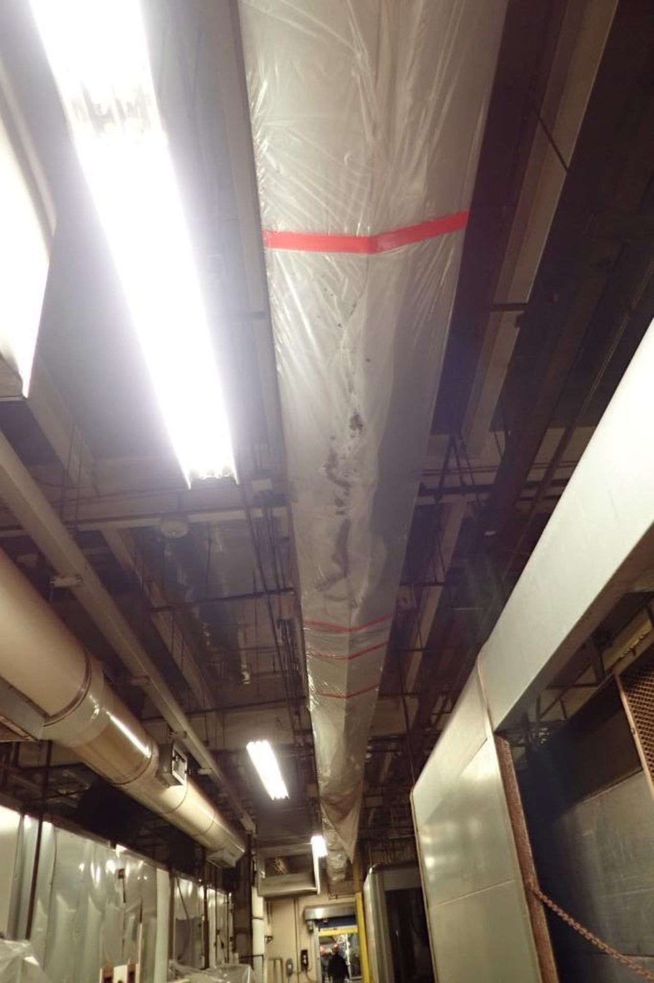 SS belt conveyor, 170 ft. long x 18 in. wide, suspended from ceiling. **Rigging Fee: $1500** - Image 3 of 7