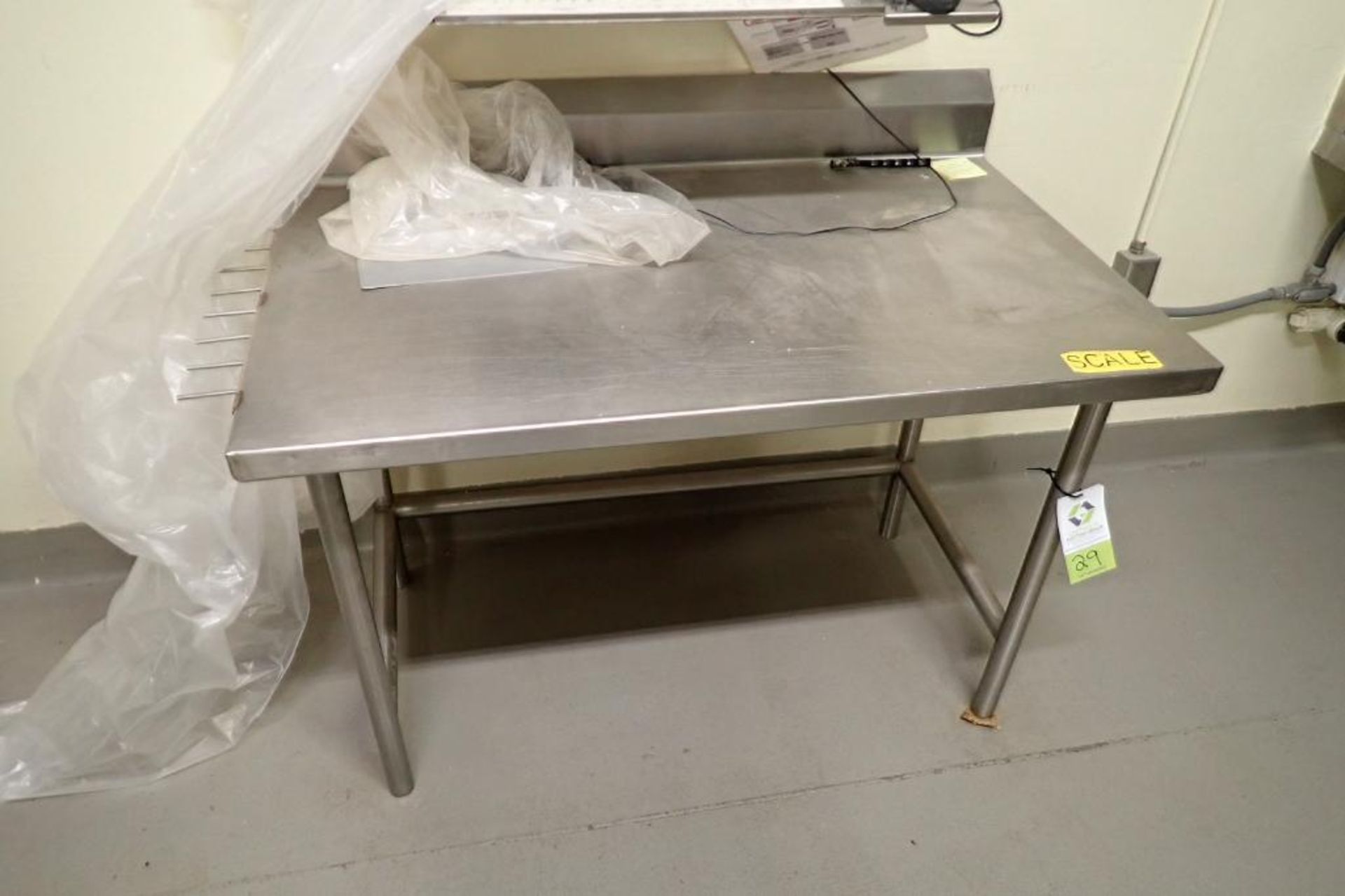 SS table, 48 in. long x 30 in. wide x 36 in. tall.. **Rigging Fee: $50**