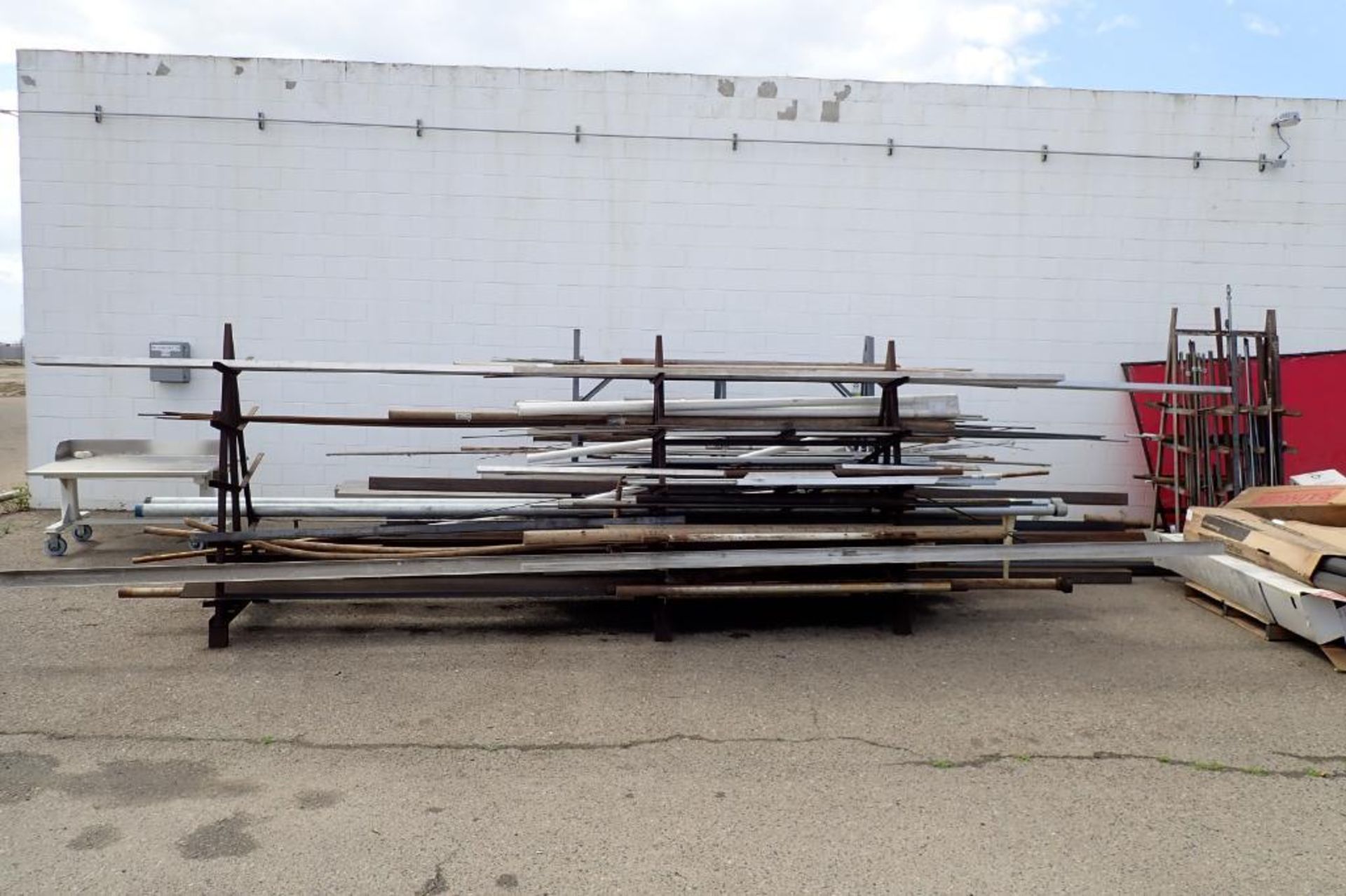 (2) A-frame racks with mild steel and stainless steel inventory. **Rigging Fee: $400**