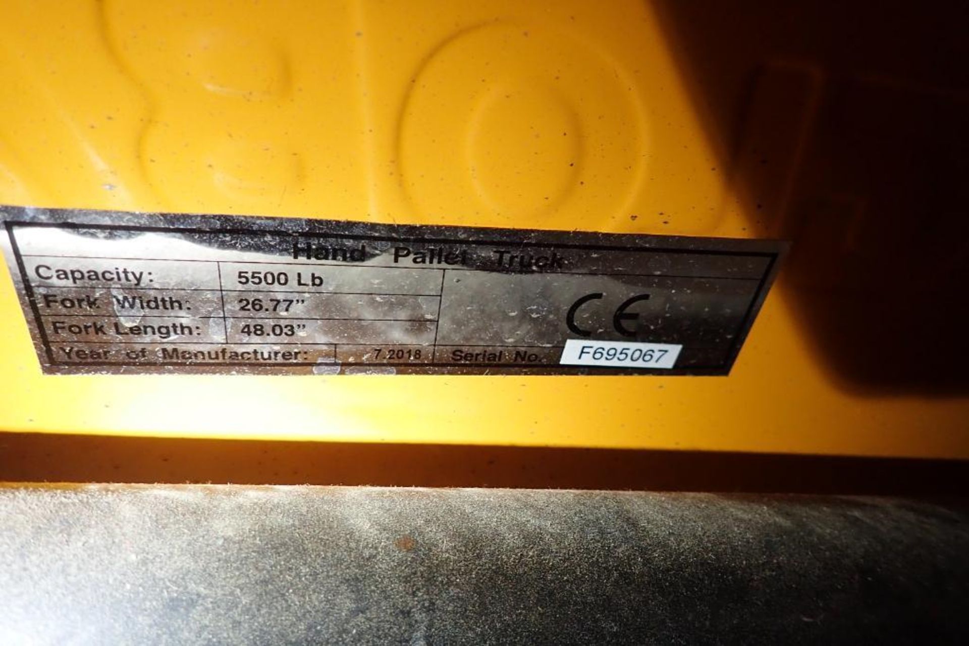 Global Industrial 5500 lb hand pallet jack, SN F695067, yellow. **Rigging Fee: $10** - Image 6 of 6