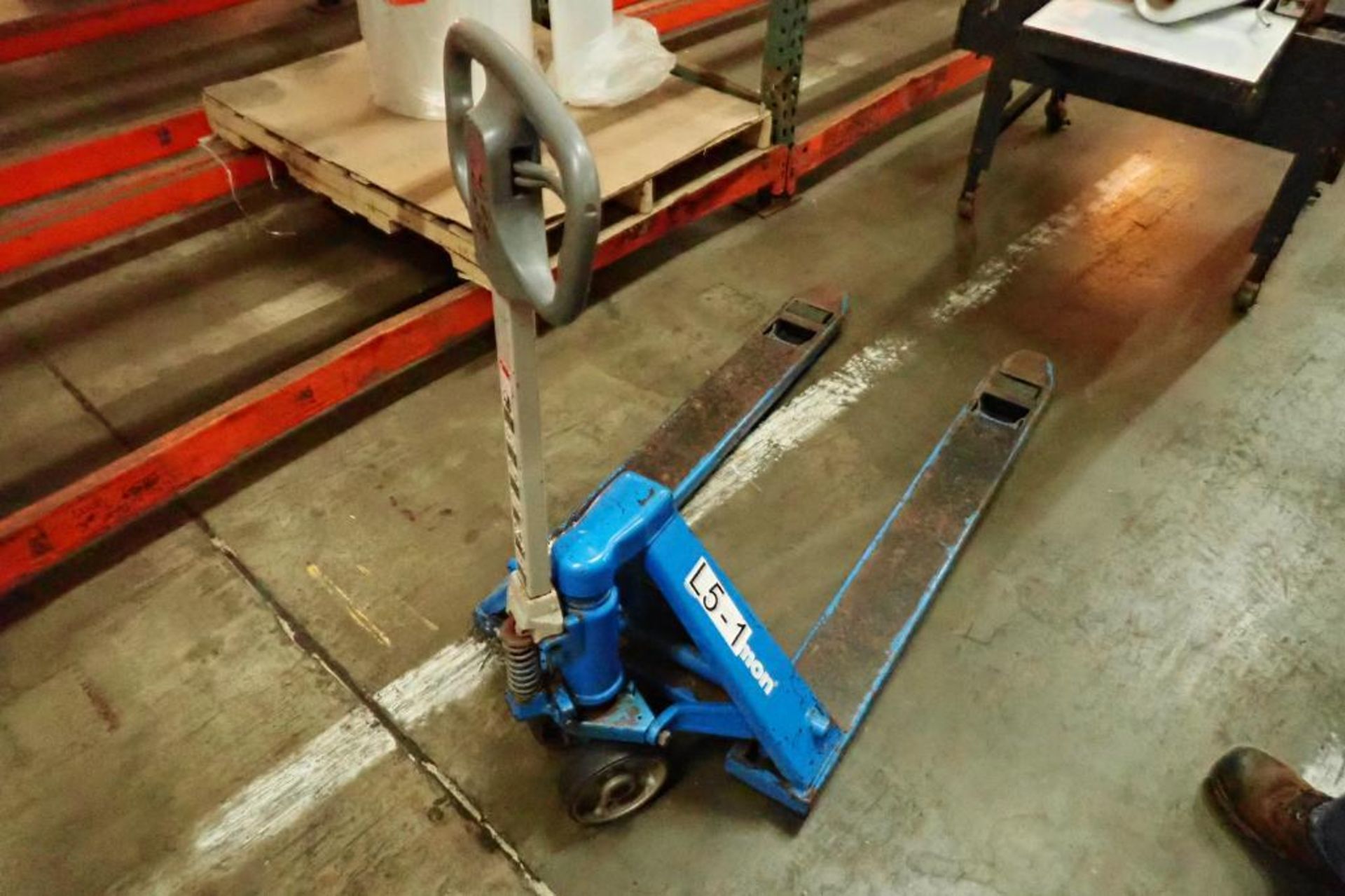 Bishamon hydraulic pallet jack, Model BS55, SN 11120521, 5,500 lb. capacity, blue. **Rigging Fee: $1