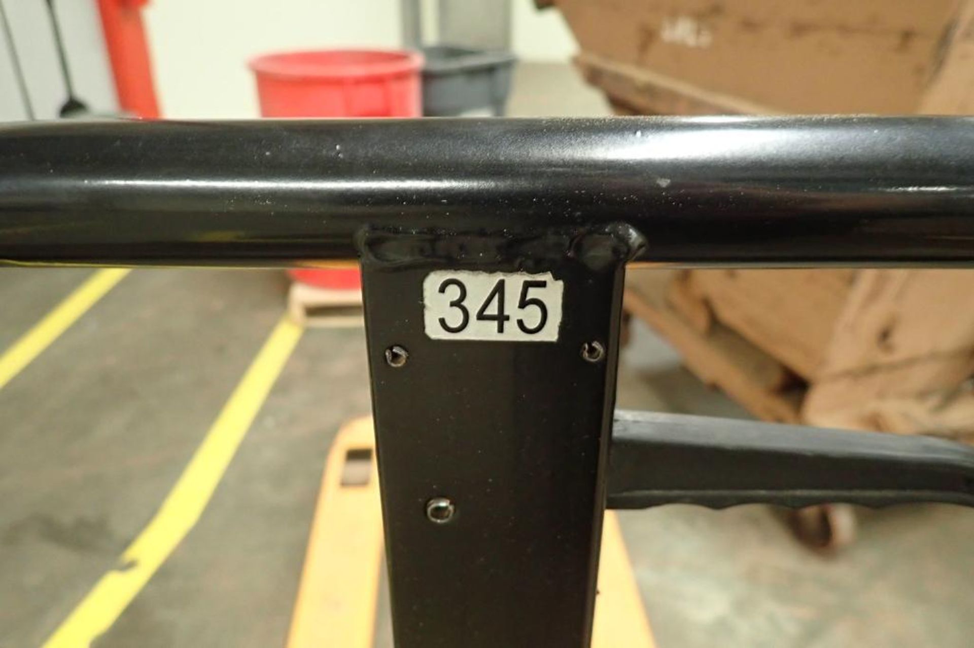 Global Industrial 5500 lb hand pallet jack, SN F684191, yellow. **Rigging Fee: $10** - Image 4 of 5