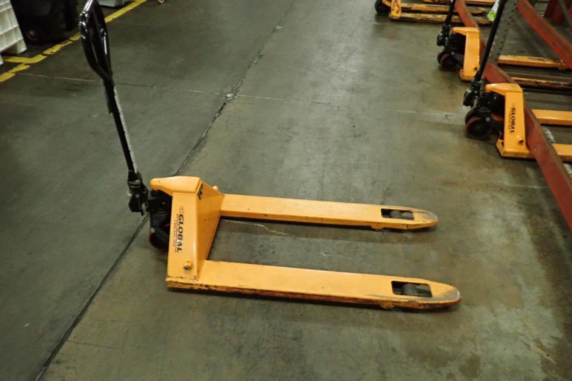 Global Industrial pallet jack, 5500 lb. capacity, SN E689118, yellow.. **Rigging Fee: $10** - Image 3 of 5