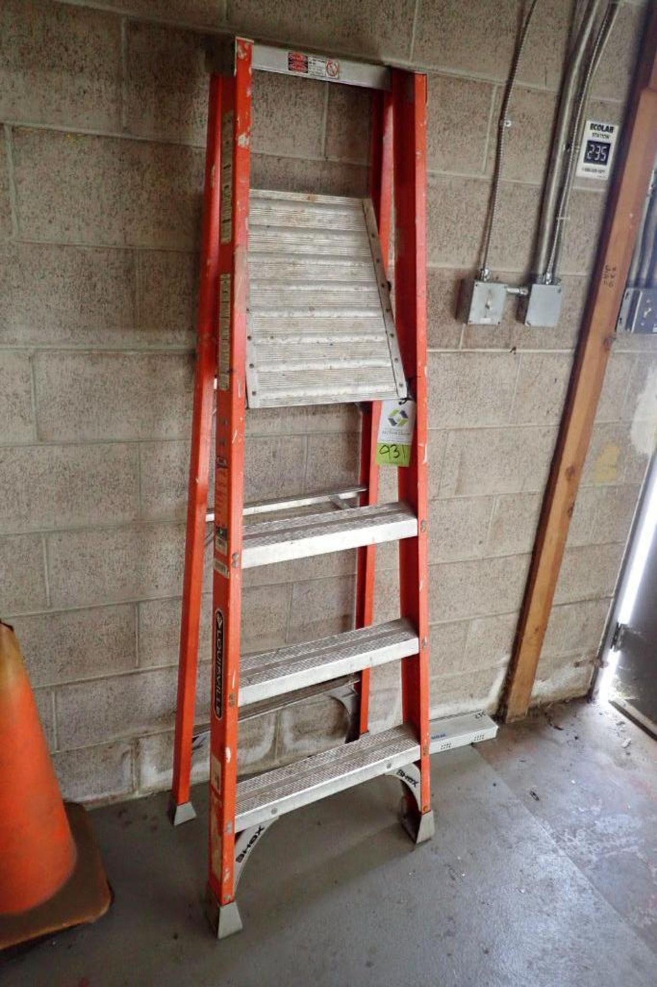 Louisville 4 ft. platform fiberglass step ladder (orange). **Rigging Fee: $10**