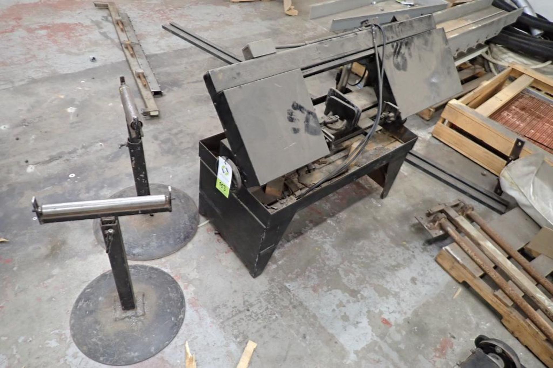 Horizontal band saw with 2 adjustable stands. **Rigging Fee: $75**