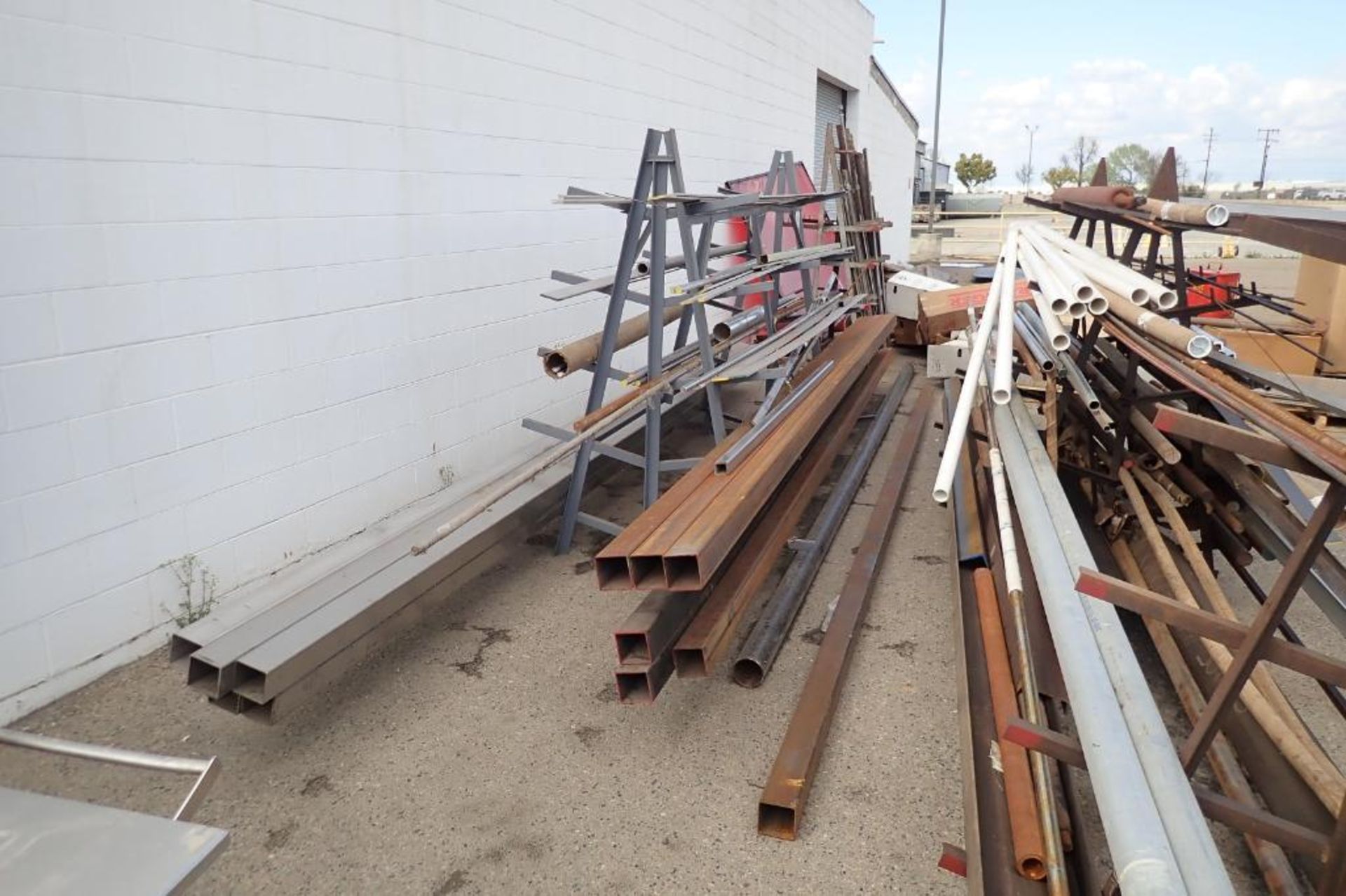(2) A-frame racks with mild steel and stainless steel inventory. **Rigging Fee: $400** - Image 4 of 16