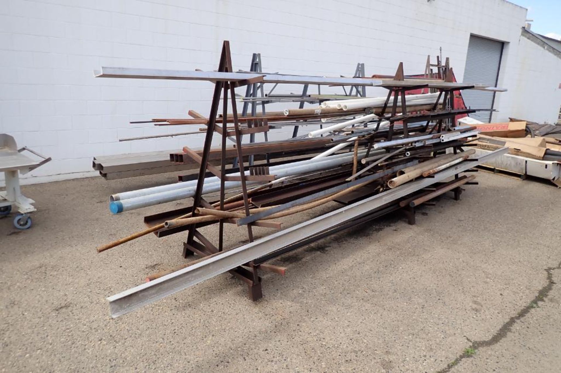 (2) A-frame racks with mild steel and stainless steel inventory. **Rigging Fee: $400** - Image 2 of 16