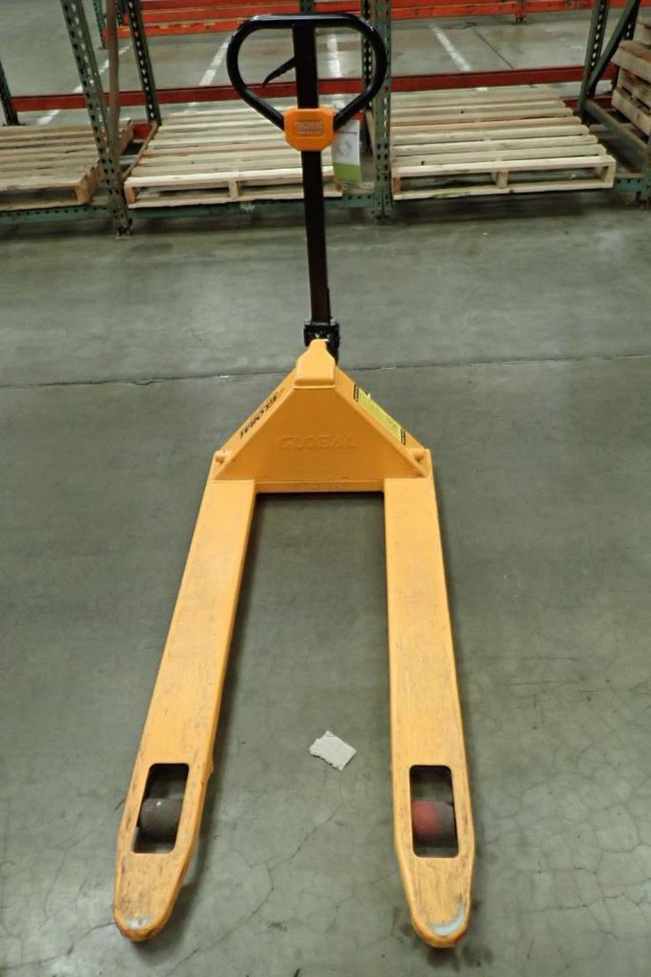 Global Industrial 5500 lb hand pallet jack, SN F695068, yellow. **Rigging Fee: $10** - Image 2 of 6