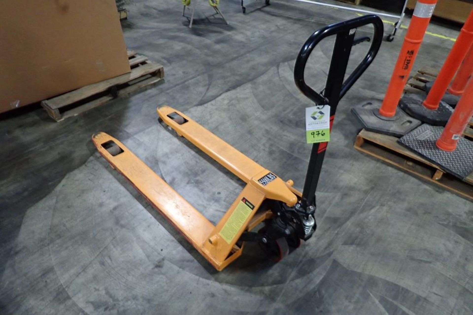 Global Industrial 5500 lb hand pallet jack, SN F684189, yellow. **Rigging Fee: $10**