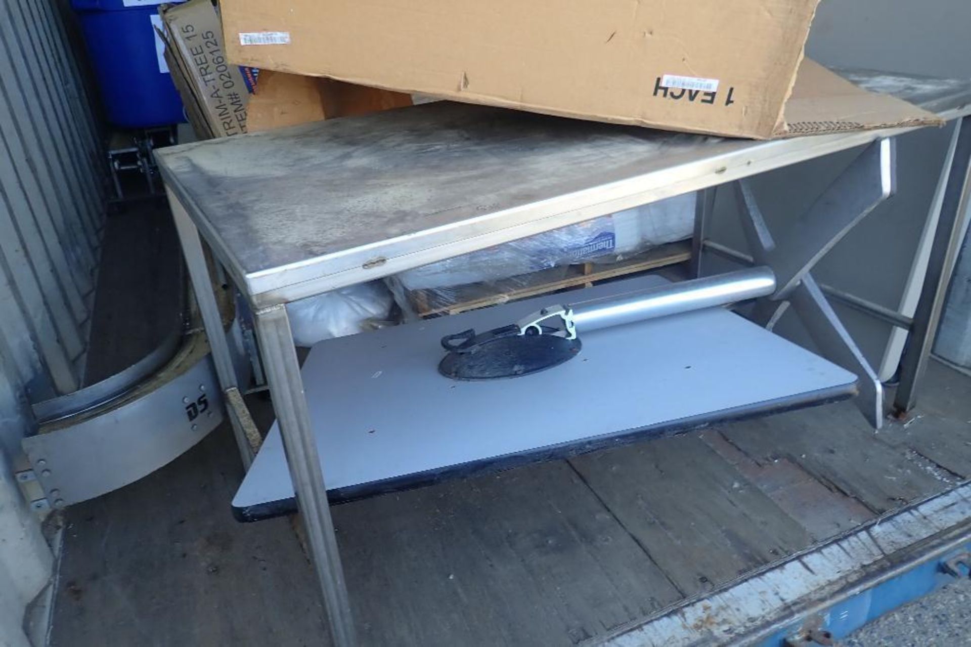 SS table, 60 in. long x 30 in. wide x 33 in. tall. **Rigging Fee: $50**