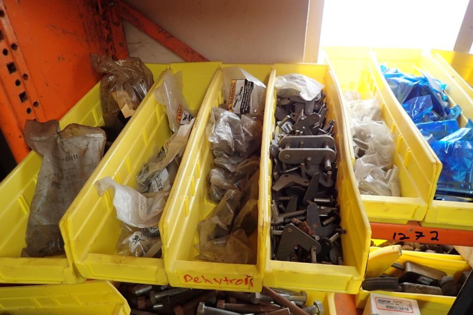 Contents only of 4 sections of shelving of assorted parts, gears, lug chain. **Rigging Fee: $150** - Image 6 of 21