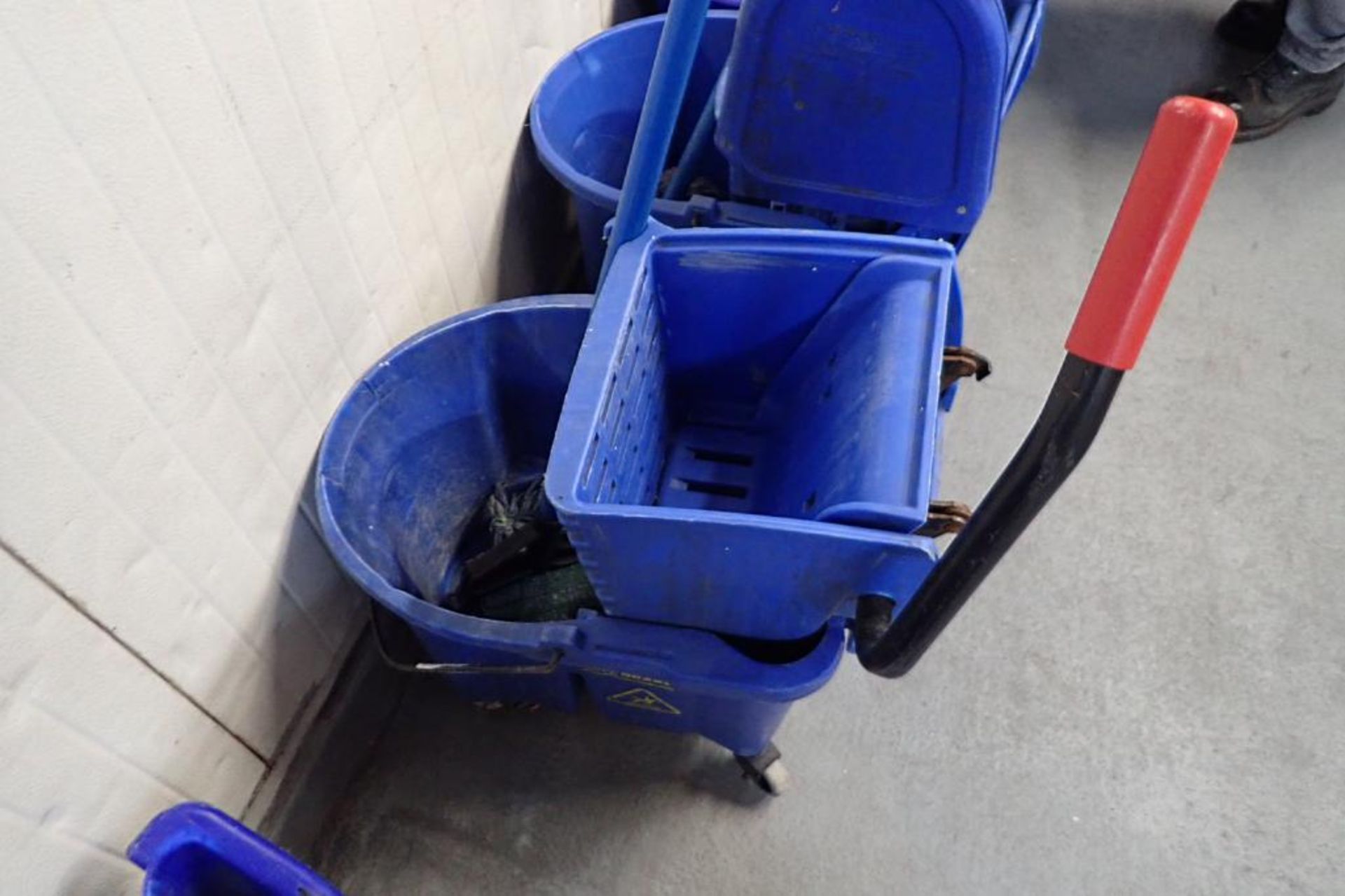 Blue mops and mop buckets, approximately 8. **Rigging Fee: $75** - Image 5 of 6