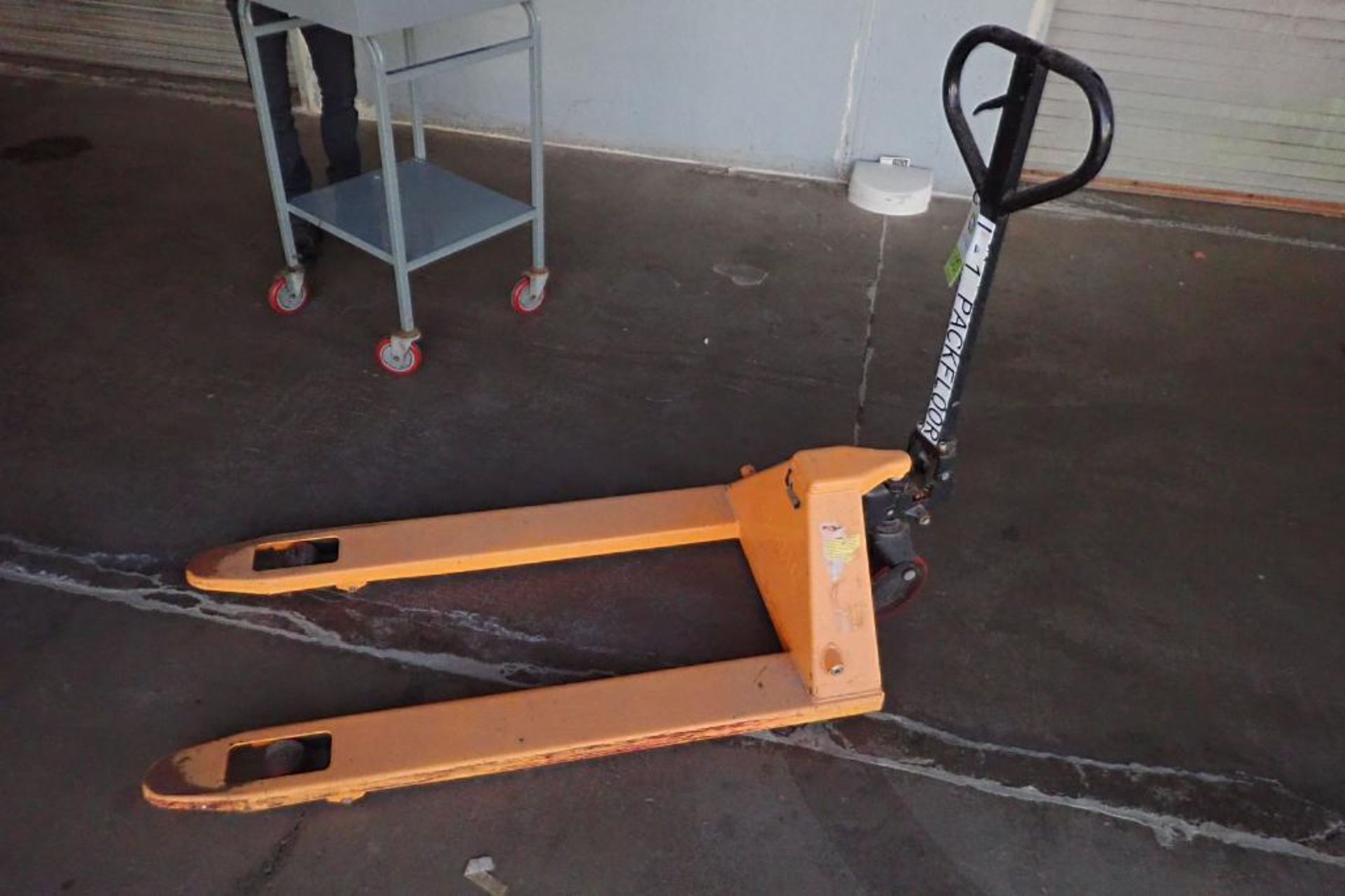 Global Industrial pallet jack, 5500 lb capacity, yellow. **Rigging Fee: $10**