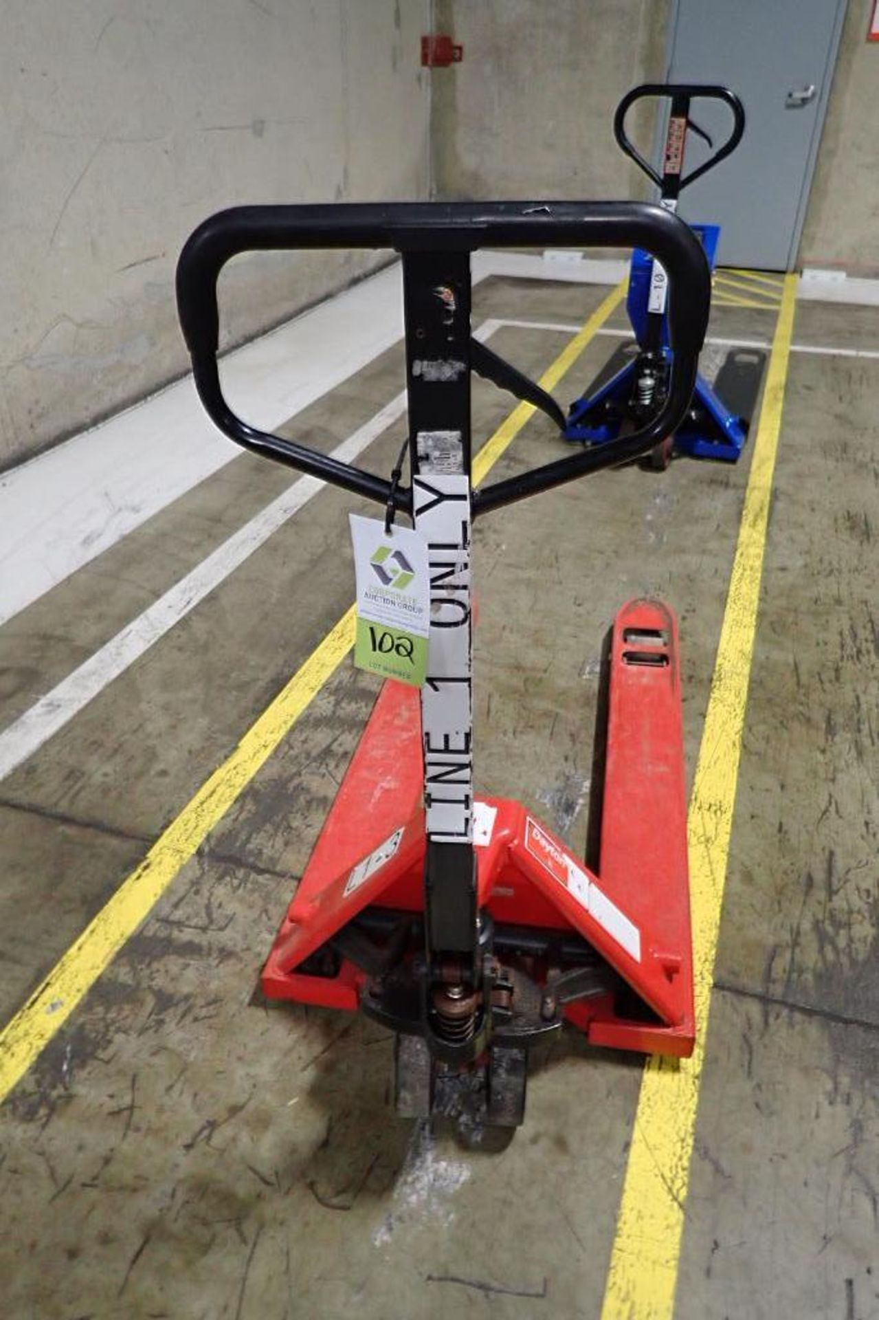 Dayton pallet jack, 6000 lb. capacity, red. **Rigging Fee: $10** - Image 2 of 4