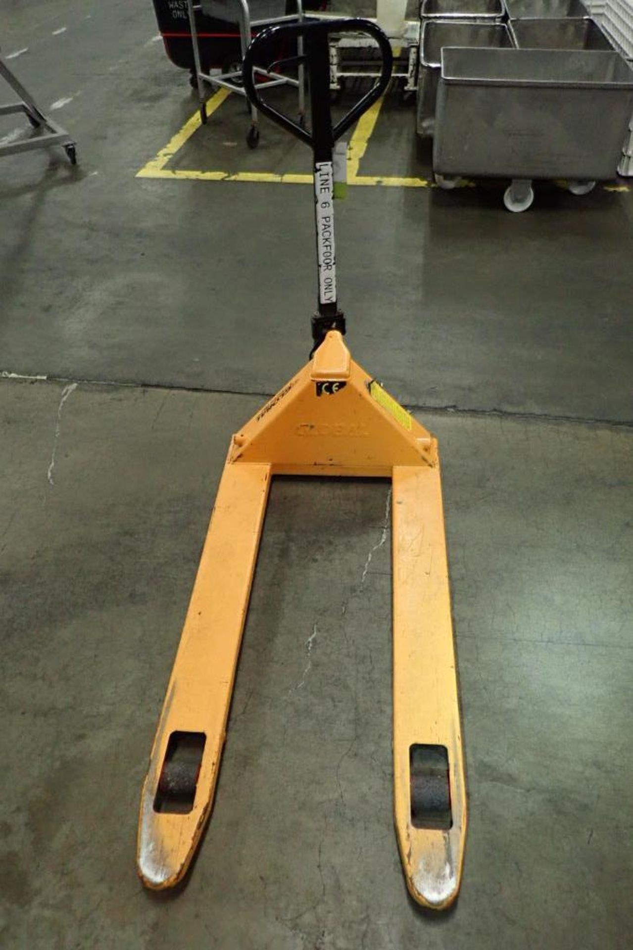 Global Industrial pallet jack, 5500 lb. capacity, SN E689118, yellow.. **Rigging Fee: $10** - Image 2 of 5