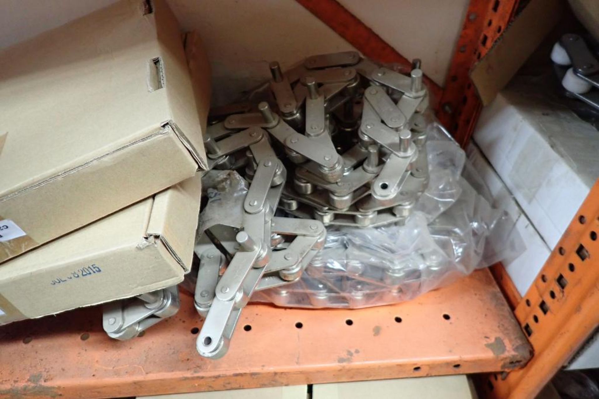 Contents only of 4 sections of shelving of assorted parts, gears, lug chain. **Rigging Fee: $150** - Image 21 of 21