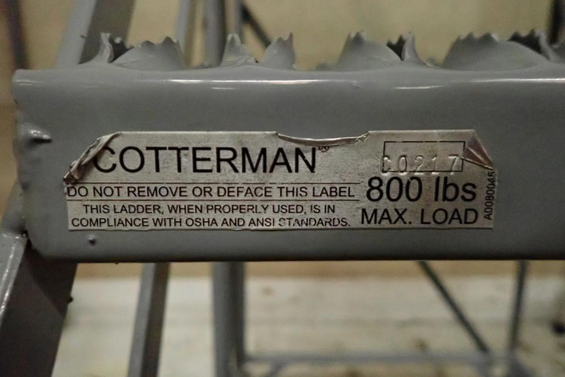 Cotterman 4-step mild steel rolling warehouse ladder. **Rigging Fee: $25** - Image 3 of 3
