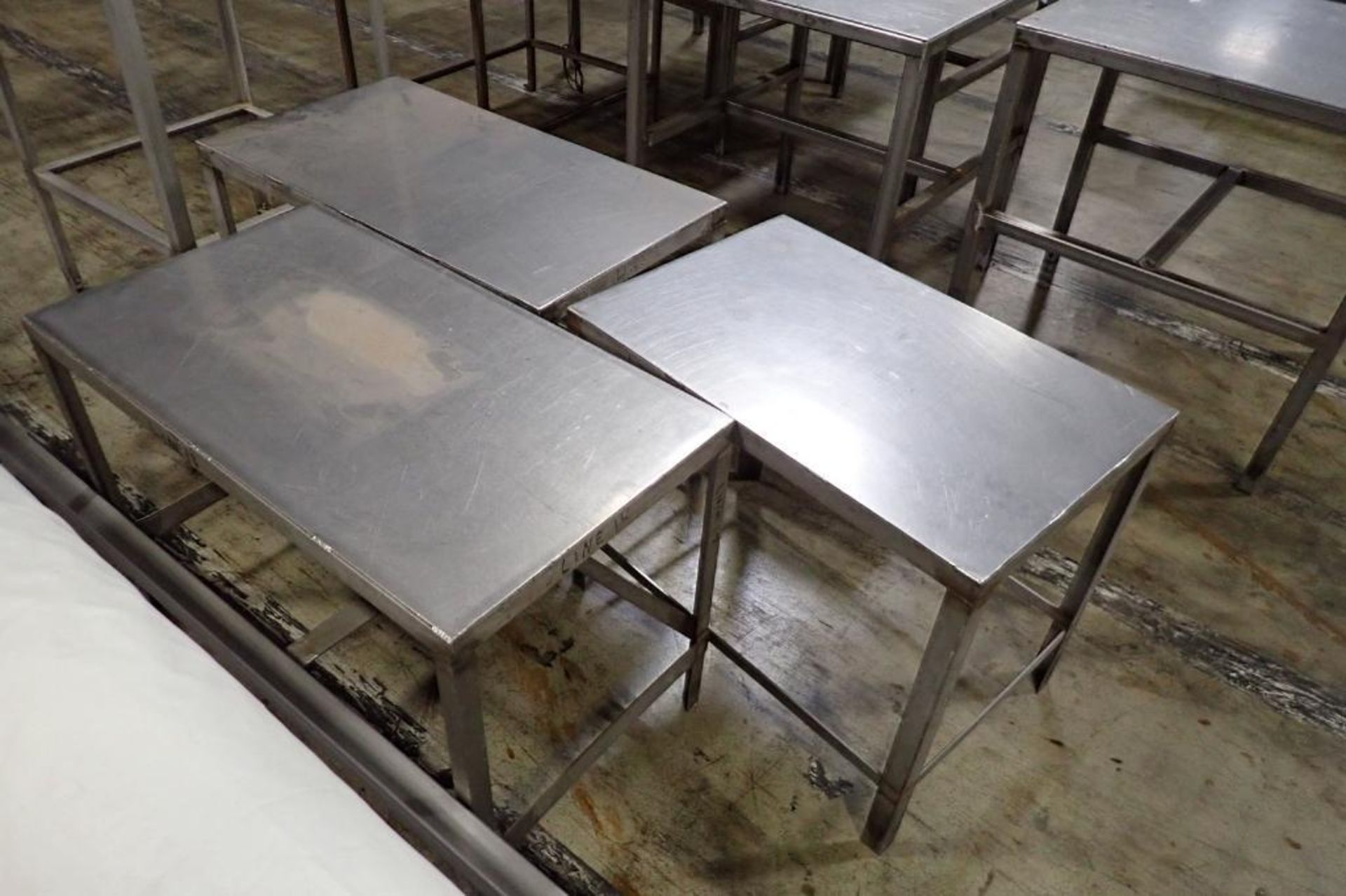 Lot of assorted SS tables. **Rigging Fee: $350** - Image 4 of 6