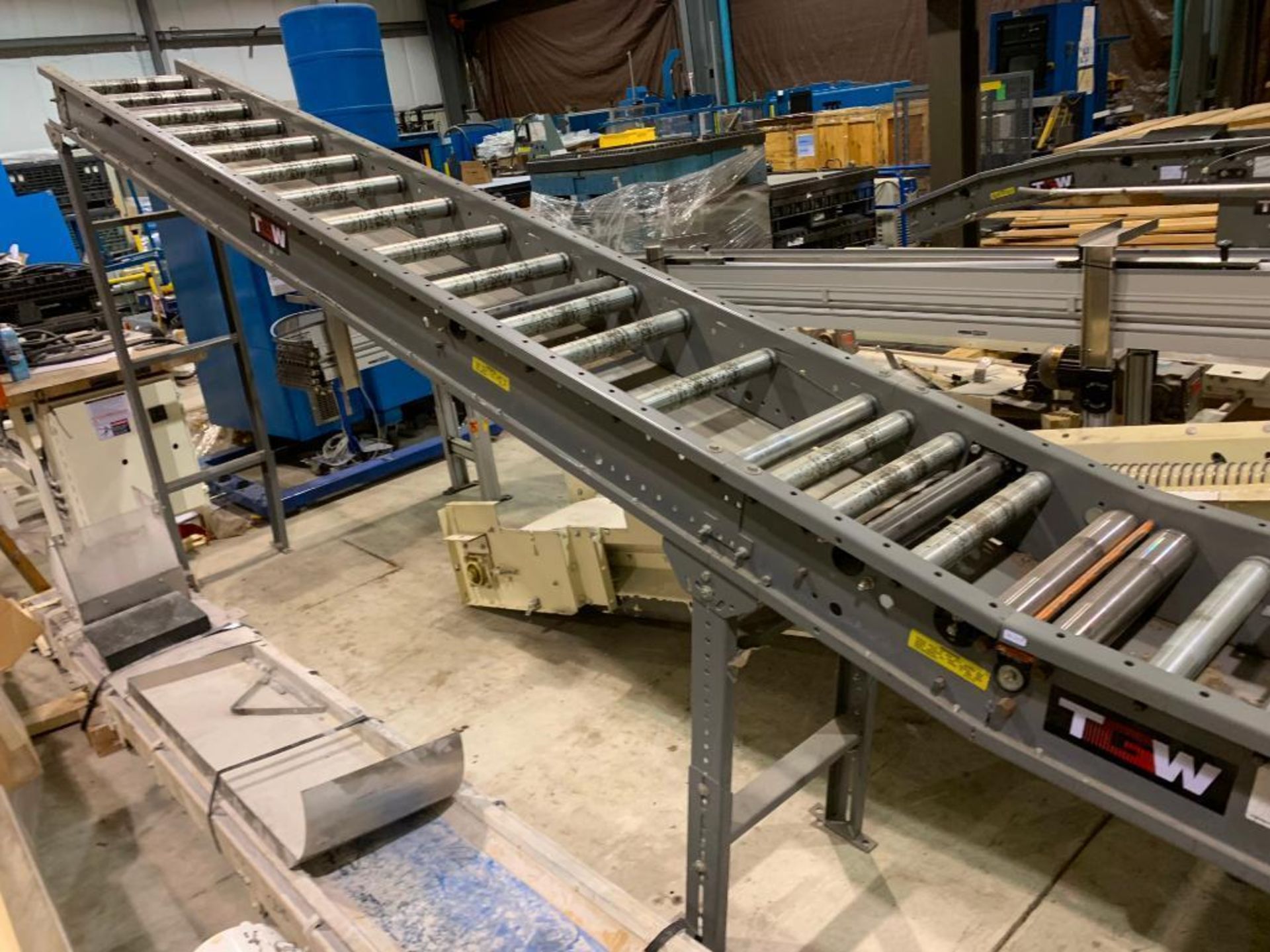 TGW mild steel gravity roller decline conveyor. (Located in Kenosha, WI)