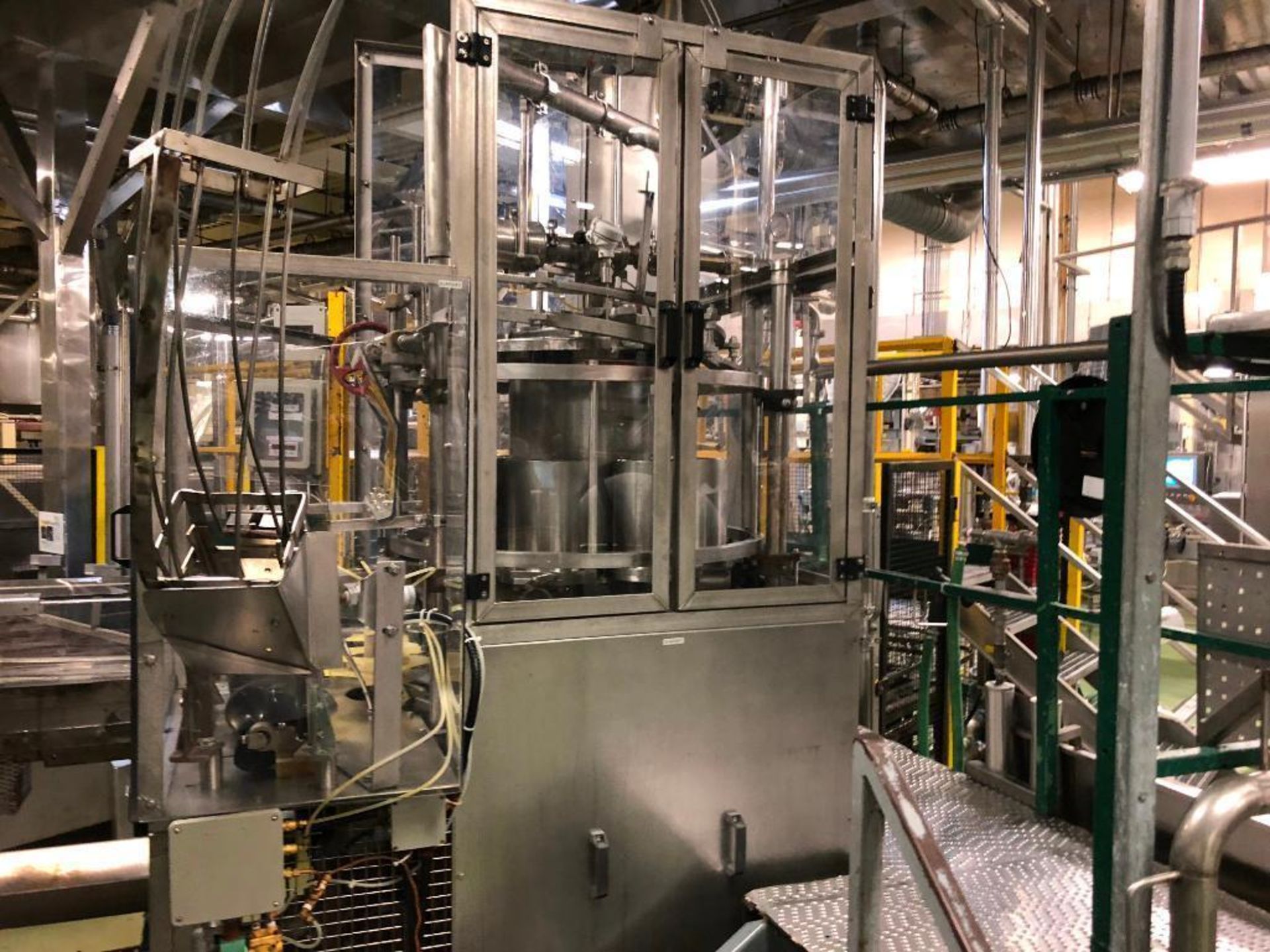 Fog/Elmar 7-head can filler for #10 cans. (Located in Winona, ON Canada)