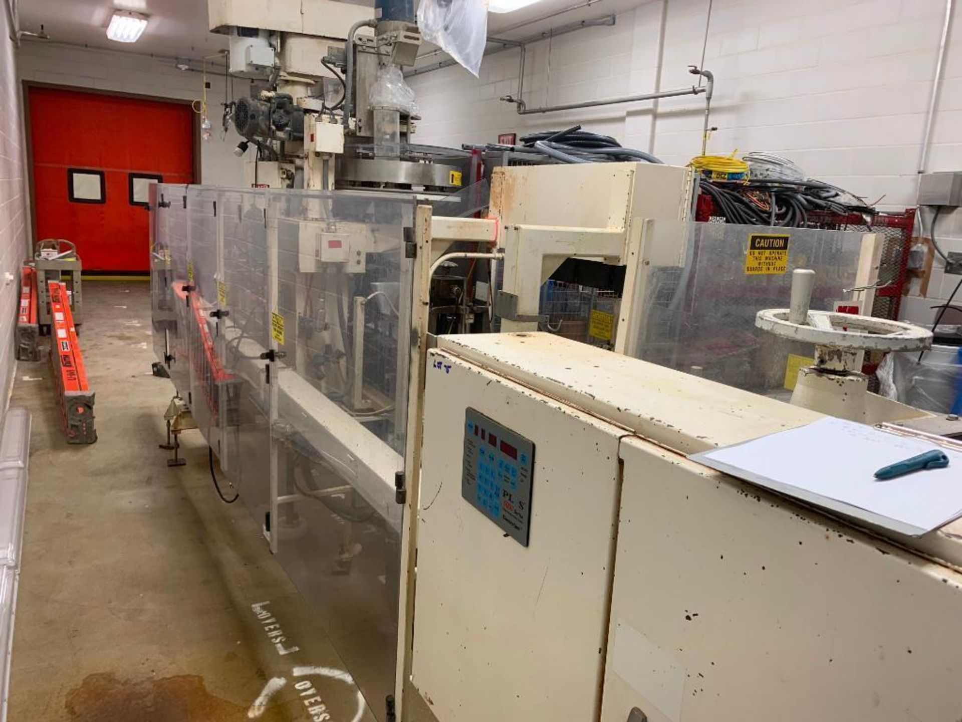 Bartelt horizontal pouch form filler. (Located in Manawa, WI)