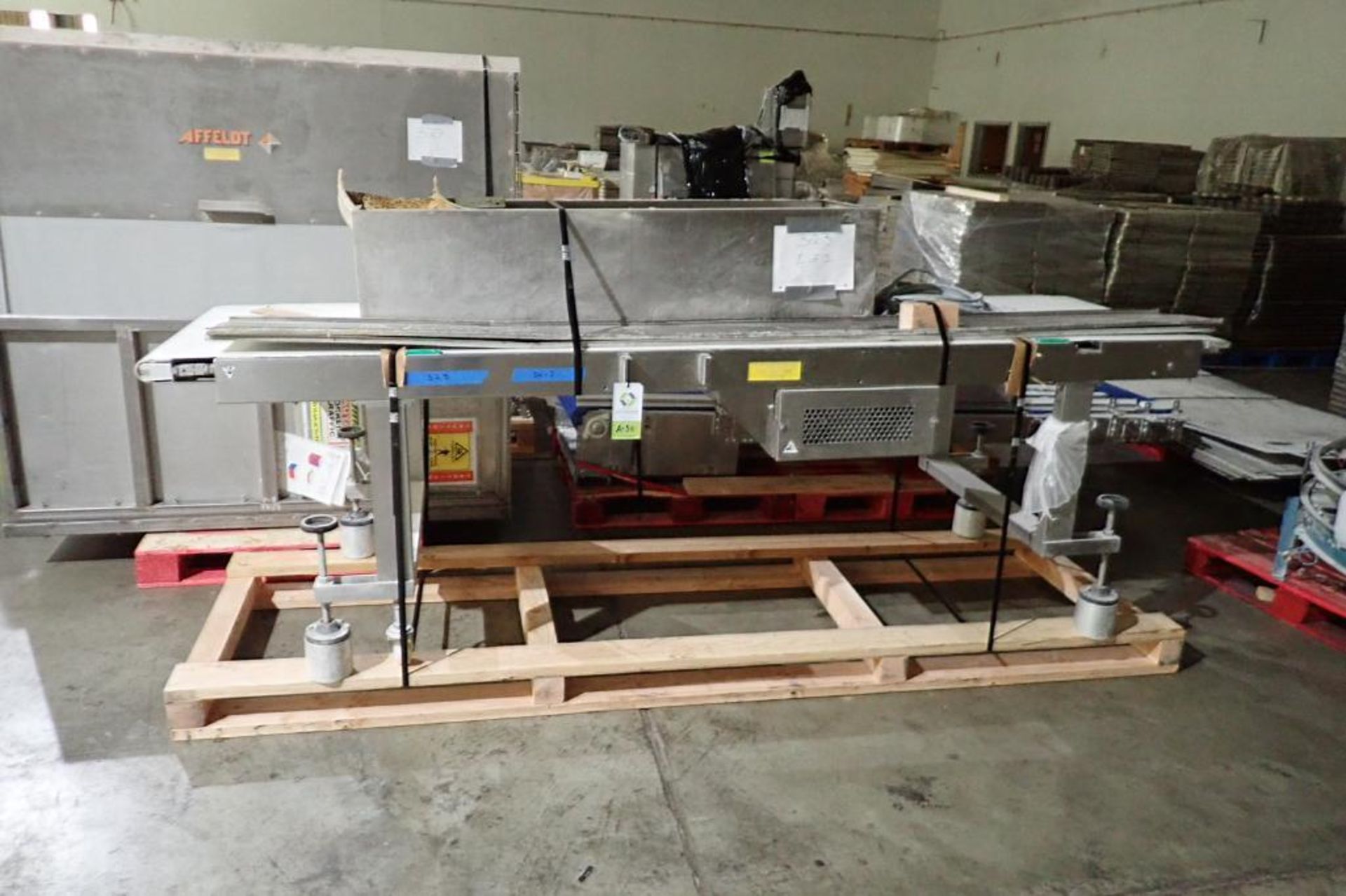 SS conveyor infeed to spiral freezer. (Located in Lodi, CA)