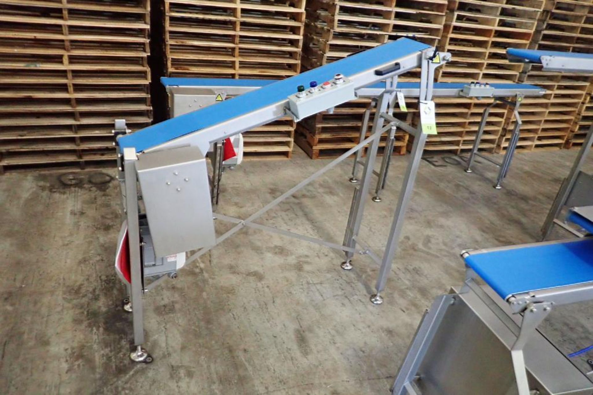 M-tech incline conveyor, blue vinyl belt 57 in. long x 7.75 in. wide x 38 in. infeed x 57 in.