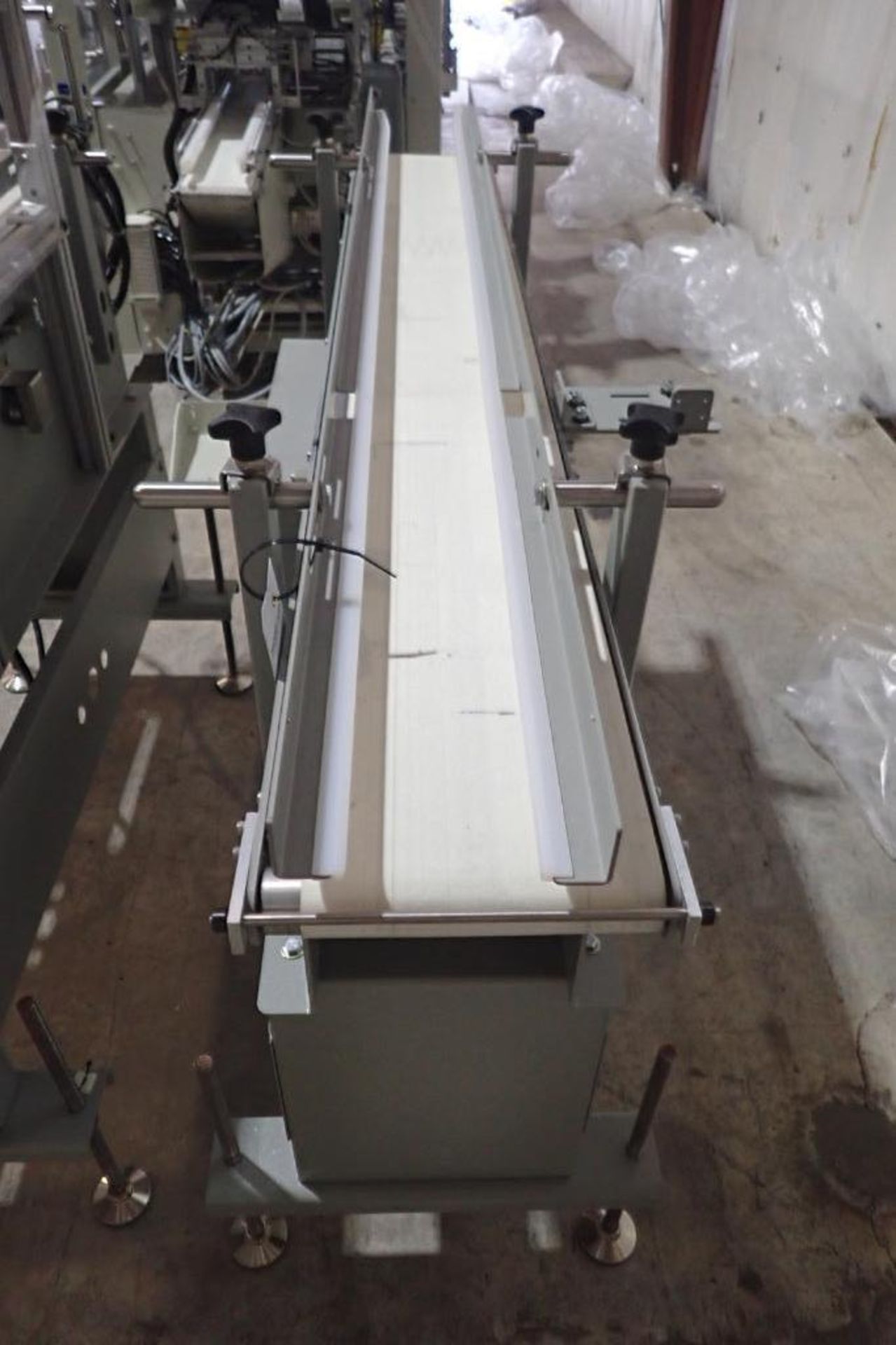 Stork Texwrap transfer conveyor, Model STE-SA438, SN SA0215, white vinyl belt, 60 in. long x 7.5 in. - Image 3 of 6