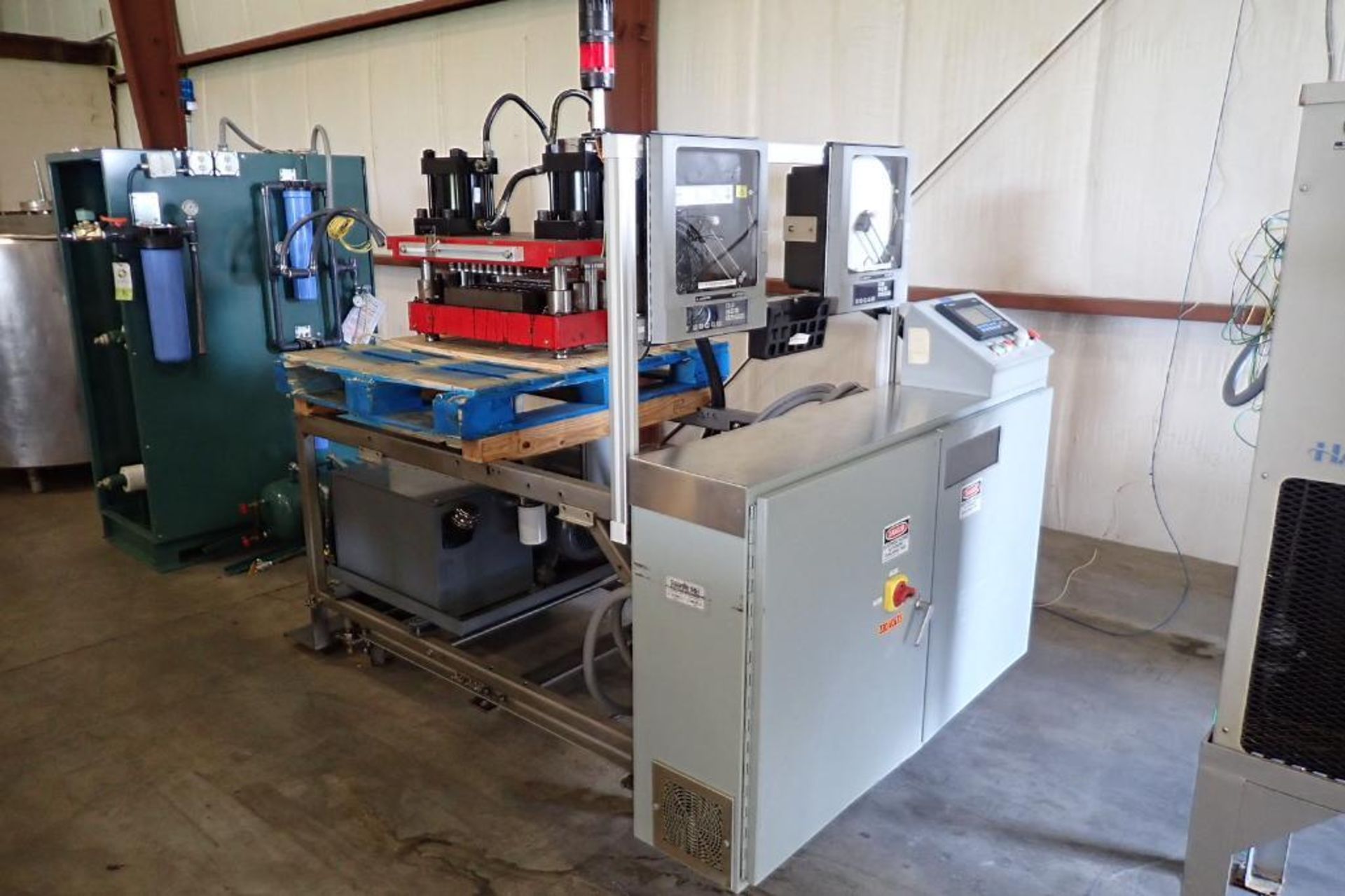 Pasteurizing control skid, 40 spot hydraulic press with hydraulic power pack, (2) Anderson AV-9000