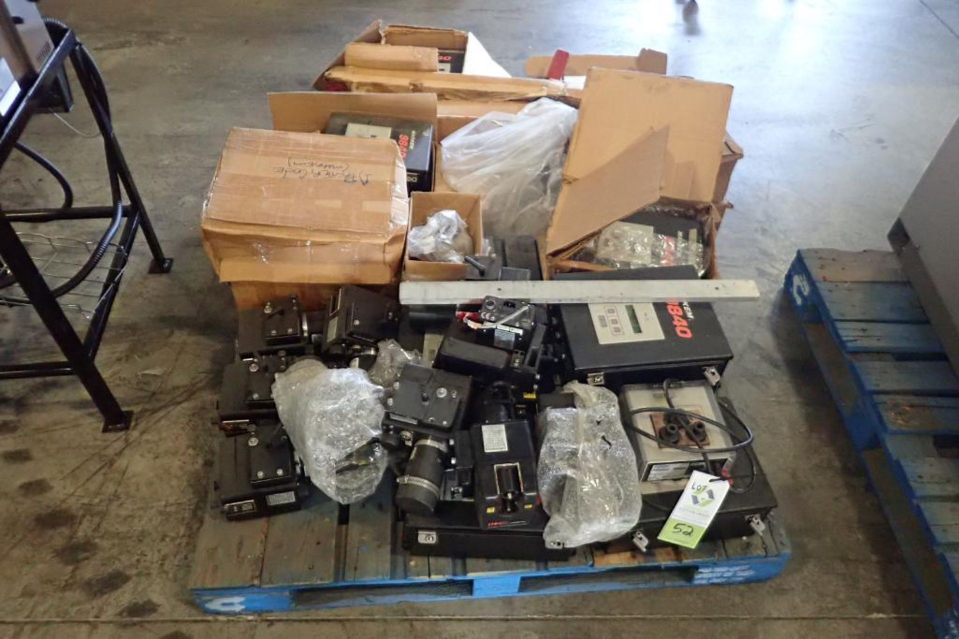 Pallet of assorted Markem 9840 coders and parts, approximately 11 control boxes { Rigging Fee: $25}