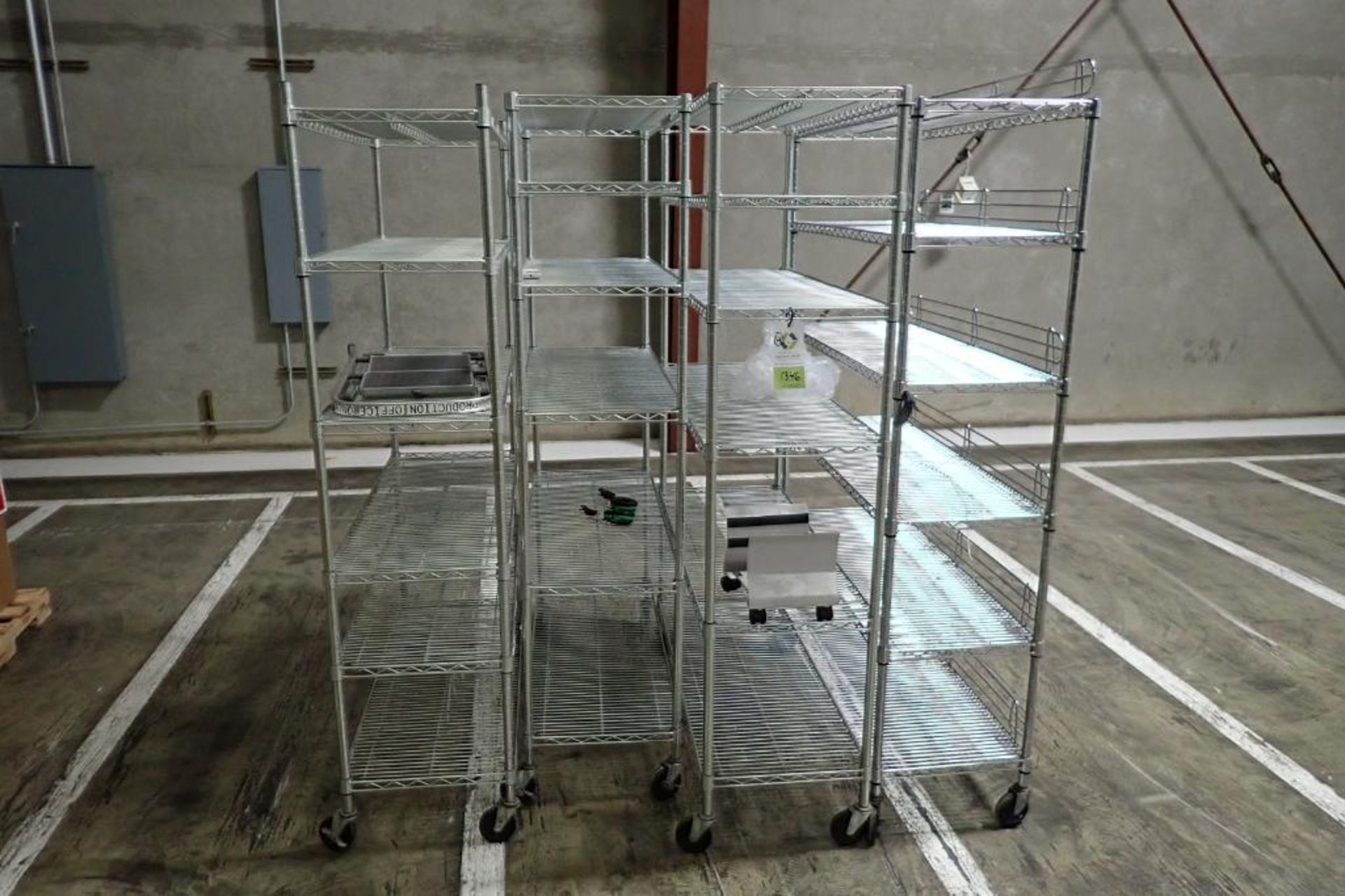 (4) Metro wire racks on wheels. {Located in Visalia, CA}